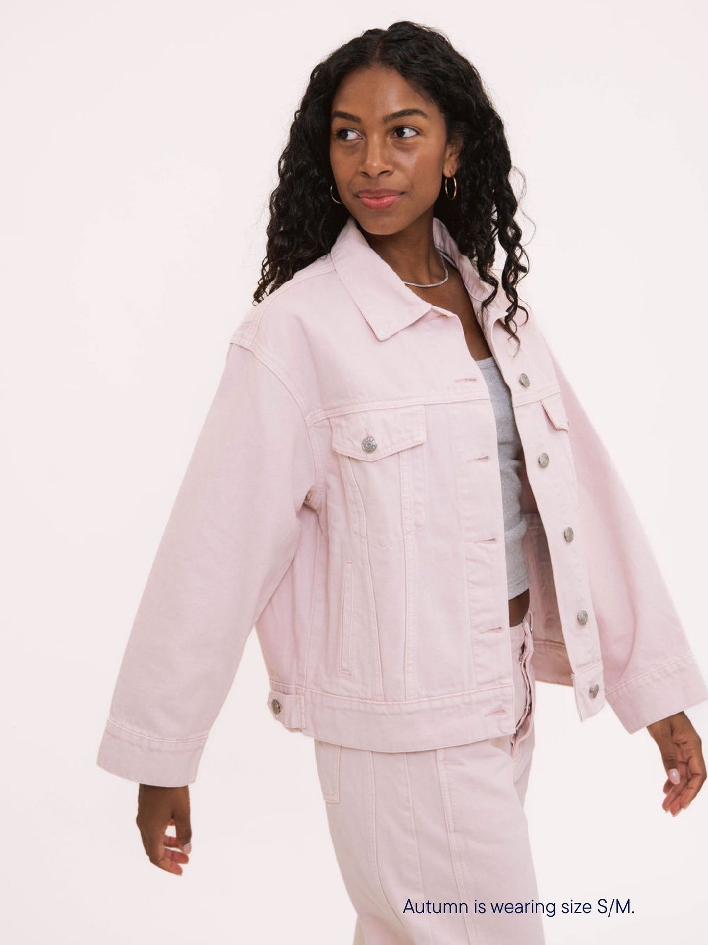 girl wearing parke x scl oversized jean jacket -petal