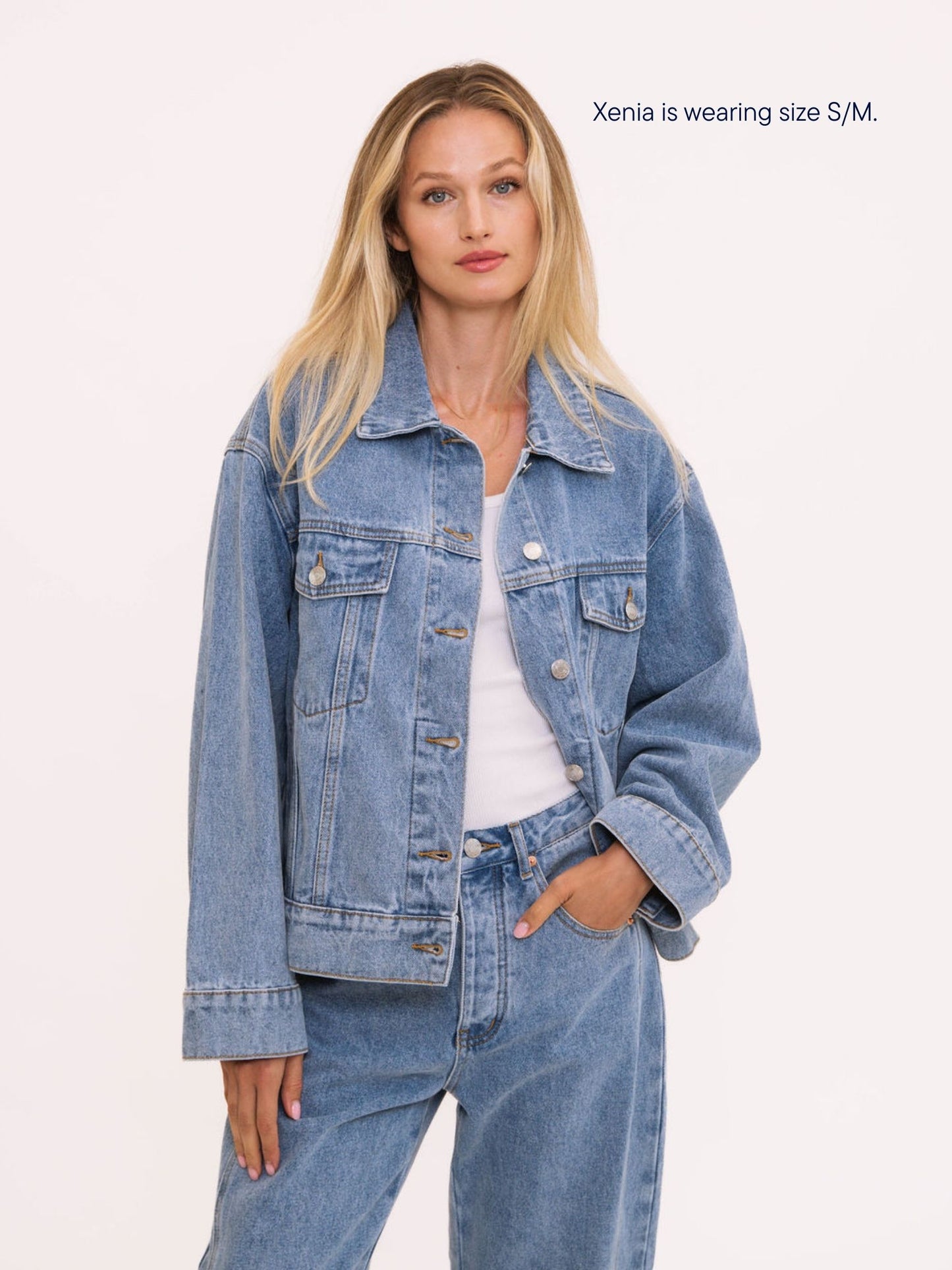 girl wearing parke x scl oversized jean jacket -vintage wash
