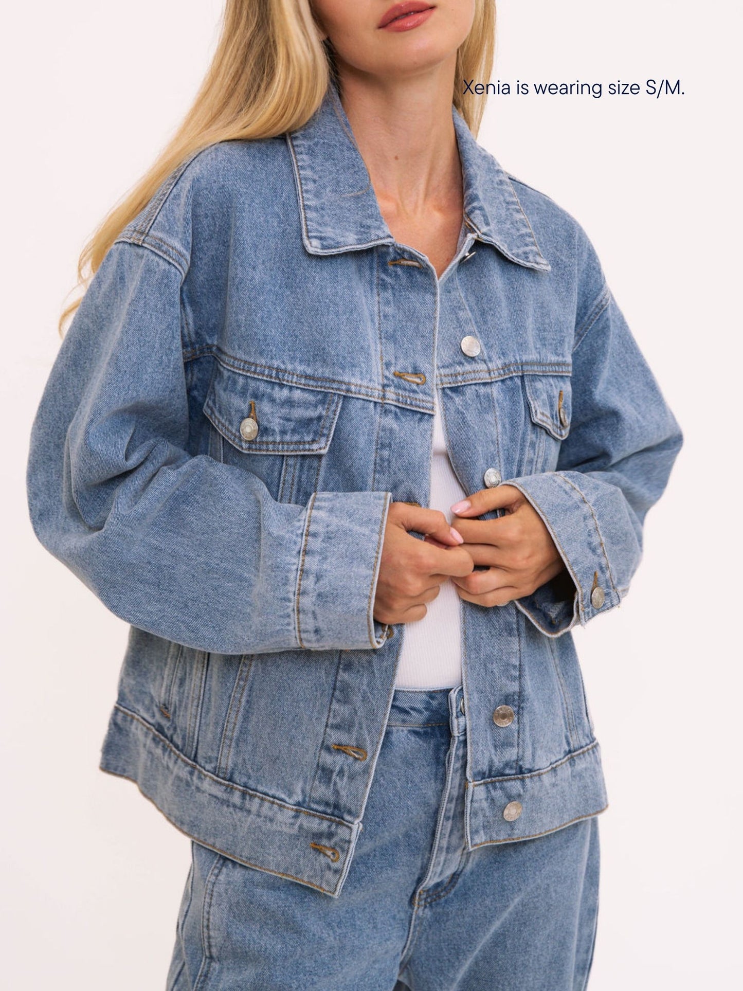 girl wearing parke x scl oversized jean jacket -vintage wash