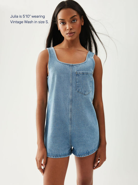 girl wearing tank top denim romper -vintage wash