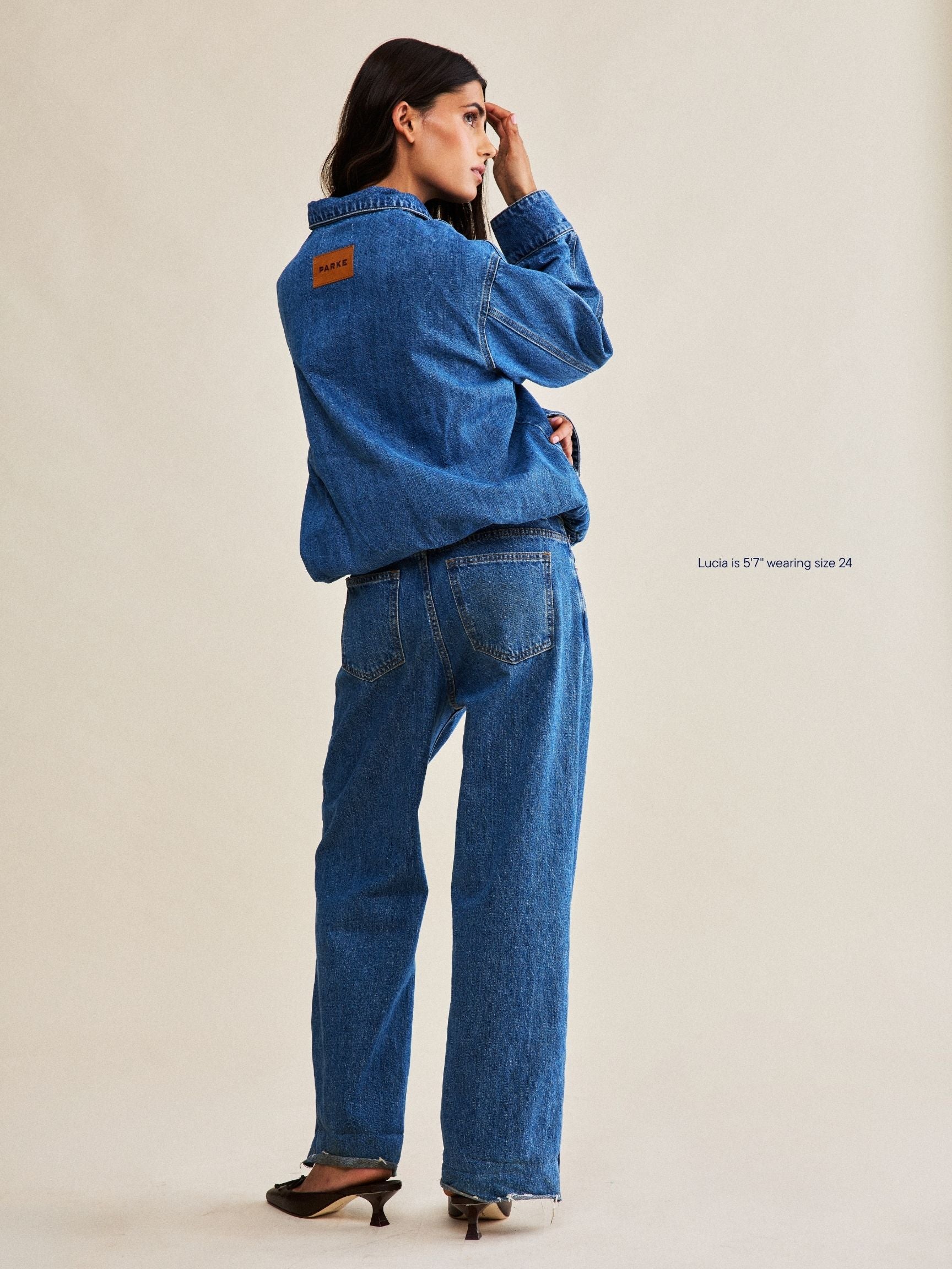 girl wearing low rise baggy jeans -medium wash