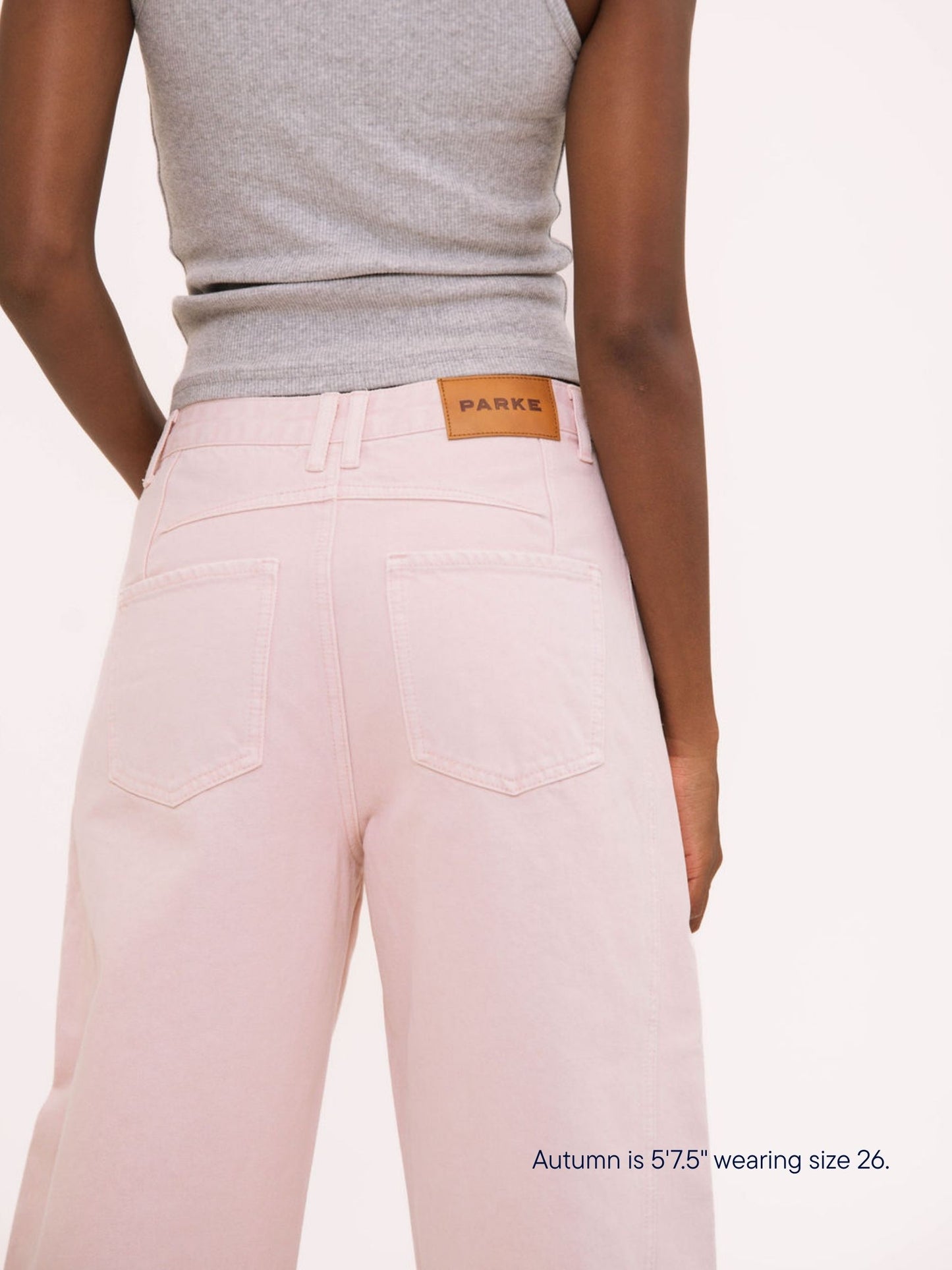 girl wearing parke x scl oversized horseshoe jean -petal