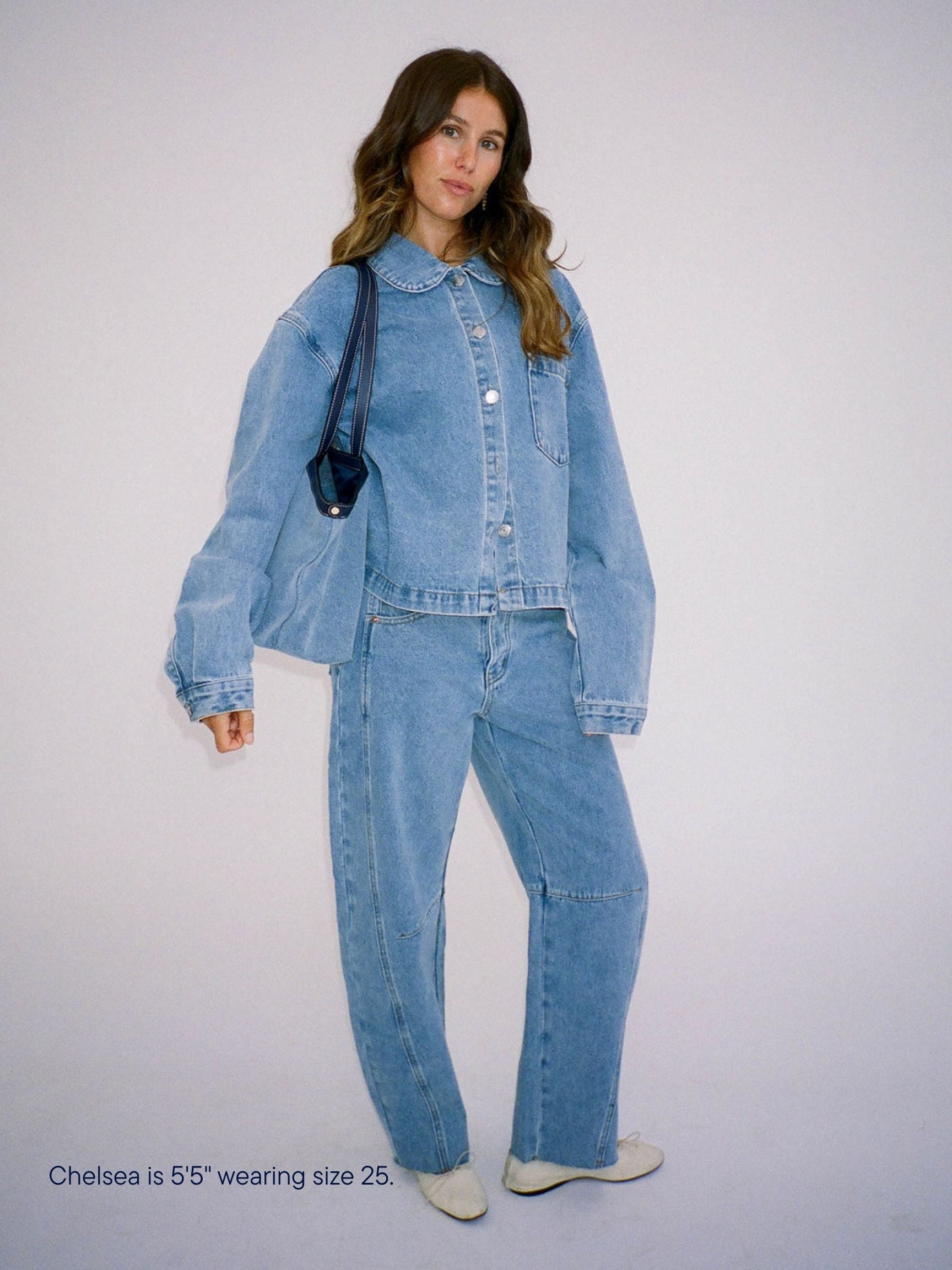 girl wearing parke x scl oversized horseshoe jean -vintage wash