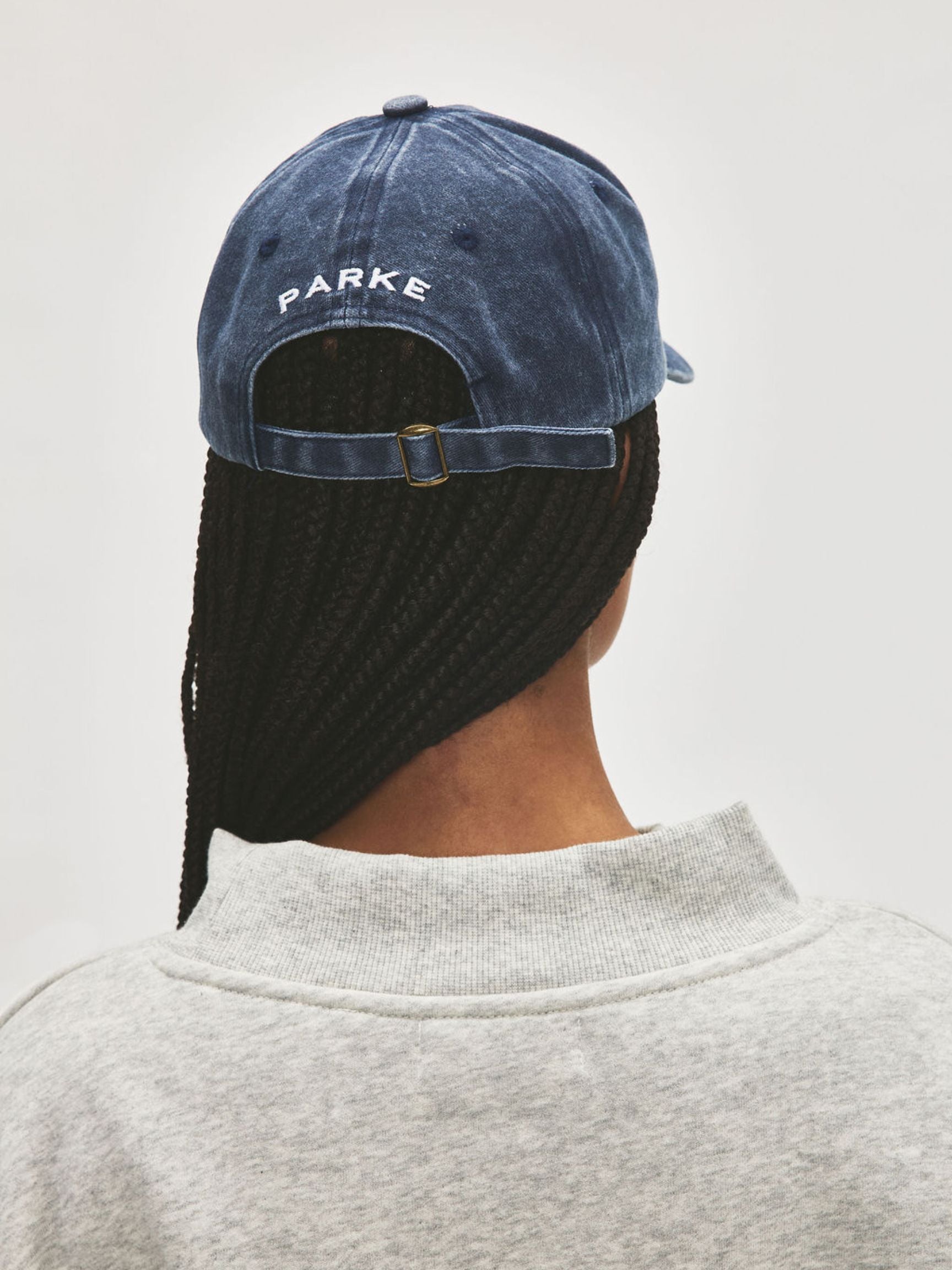 girl wearing hat -navy