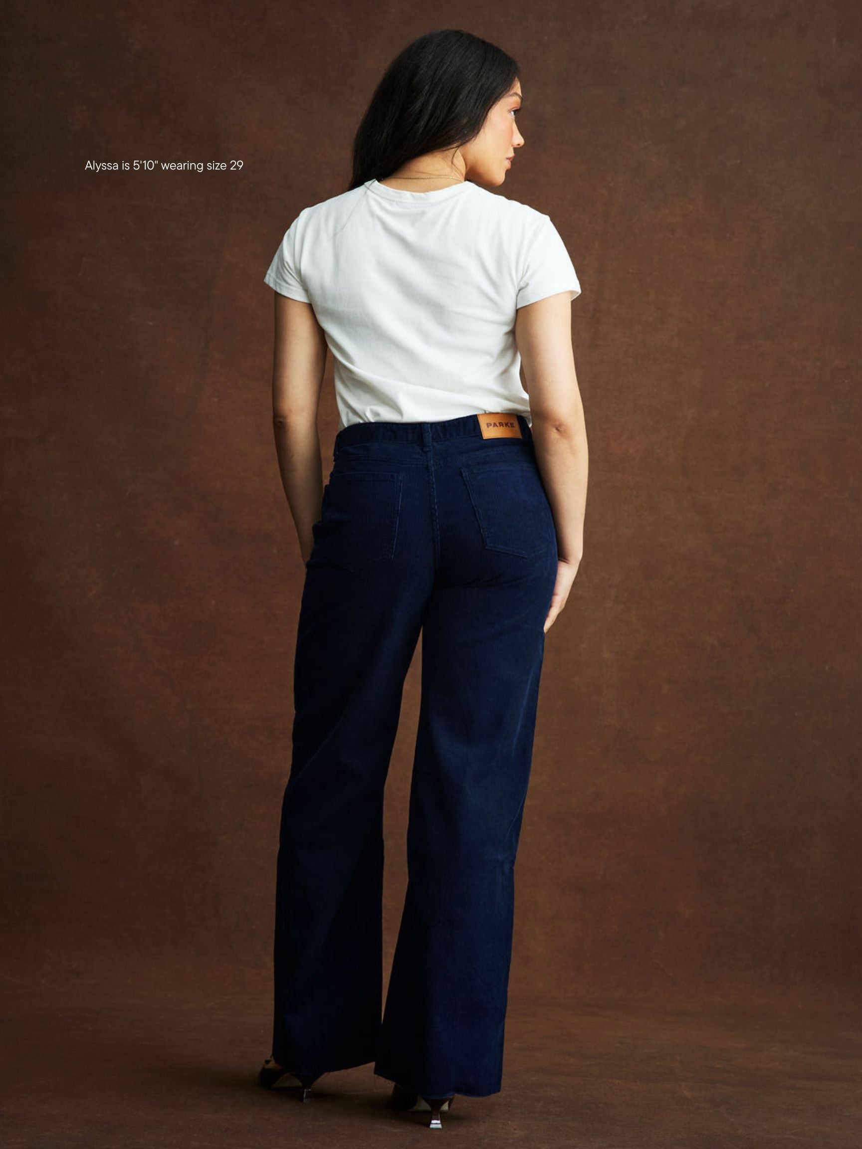girl wearing Low Rise Baggy Pants -navy corduroy