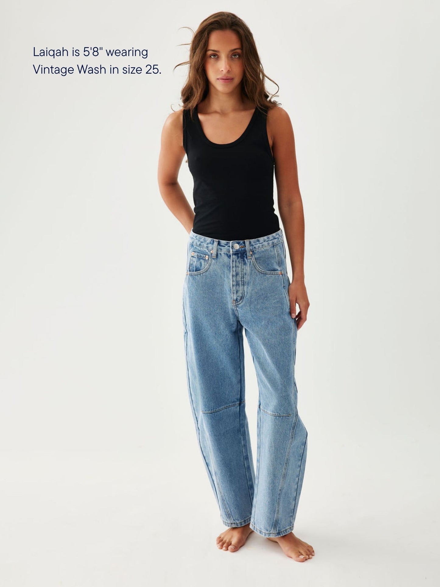 girl wearing horseshoe jeans -vintage wash