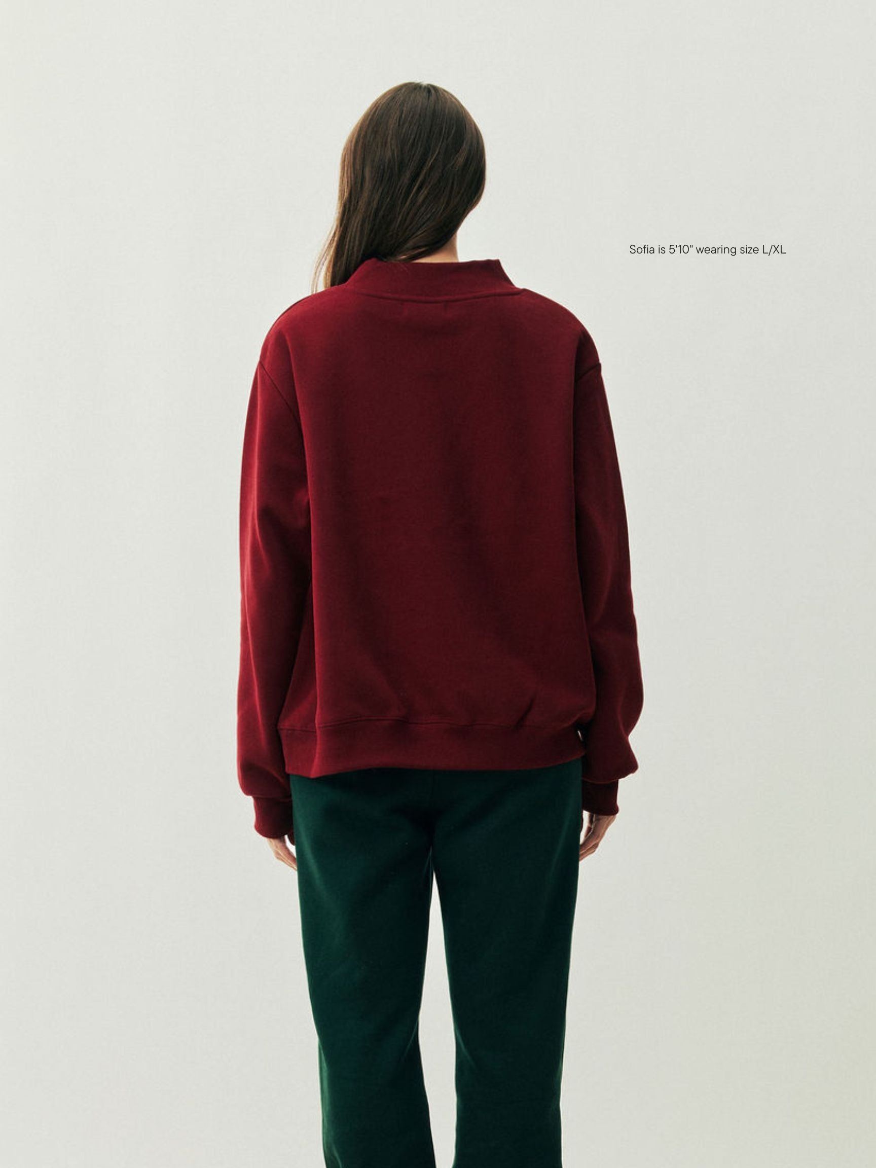 girl wearing Holiday Varsity Mockneck -maroon + forest