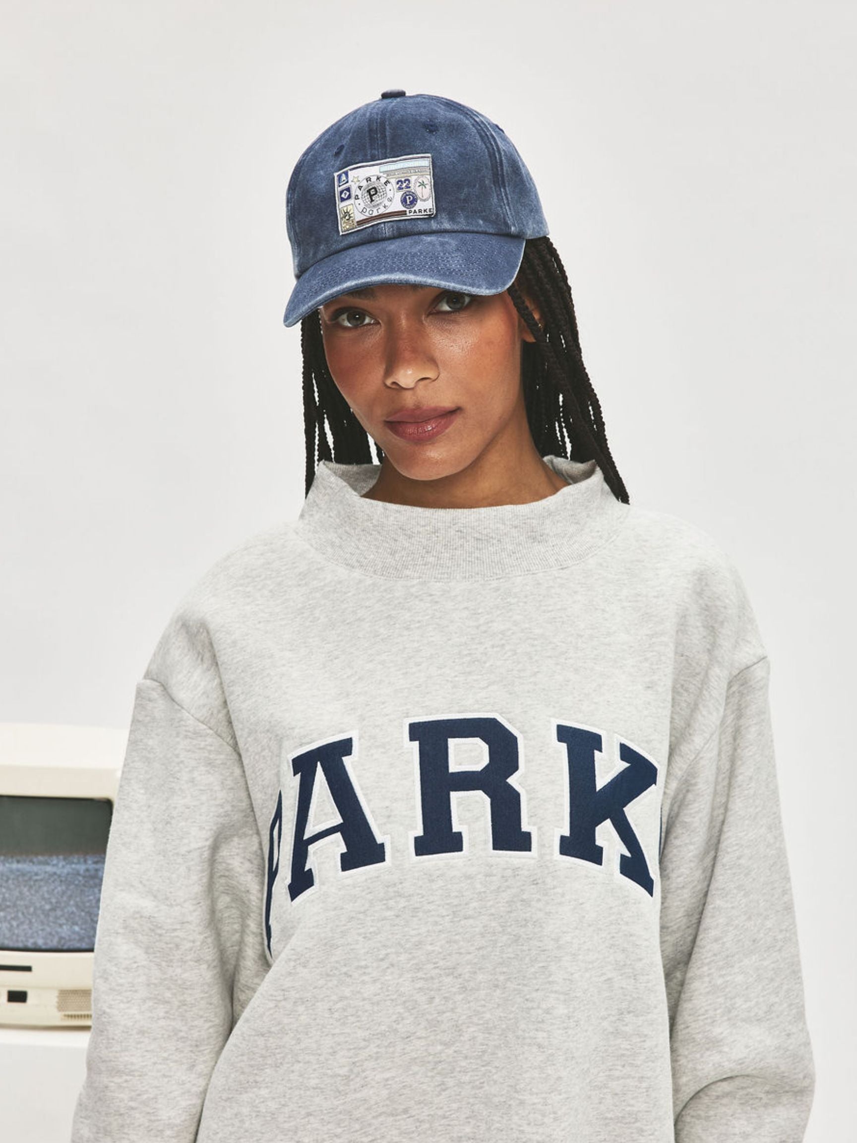 girl wearing hat -navy