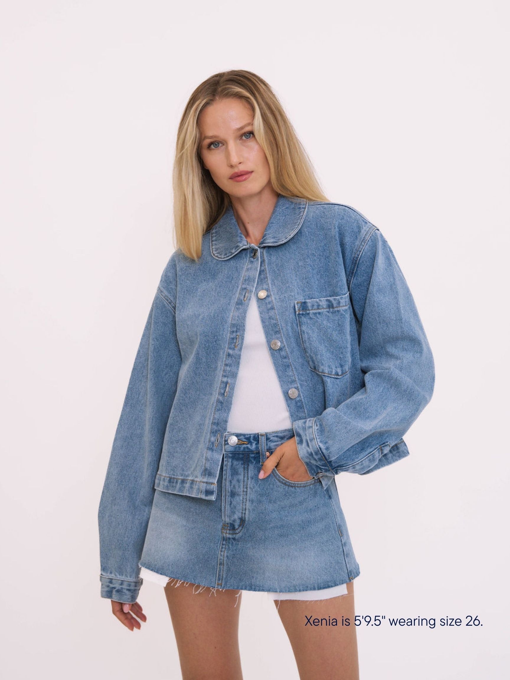girl wearing parke x scl oversized denim skirt -vintage wash