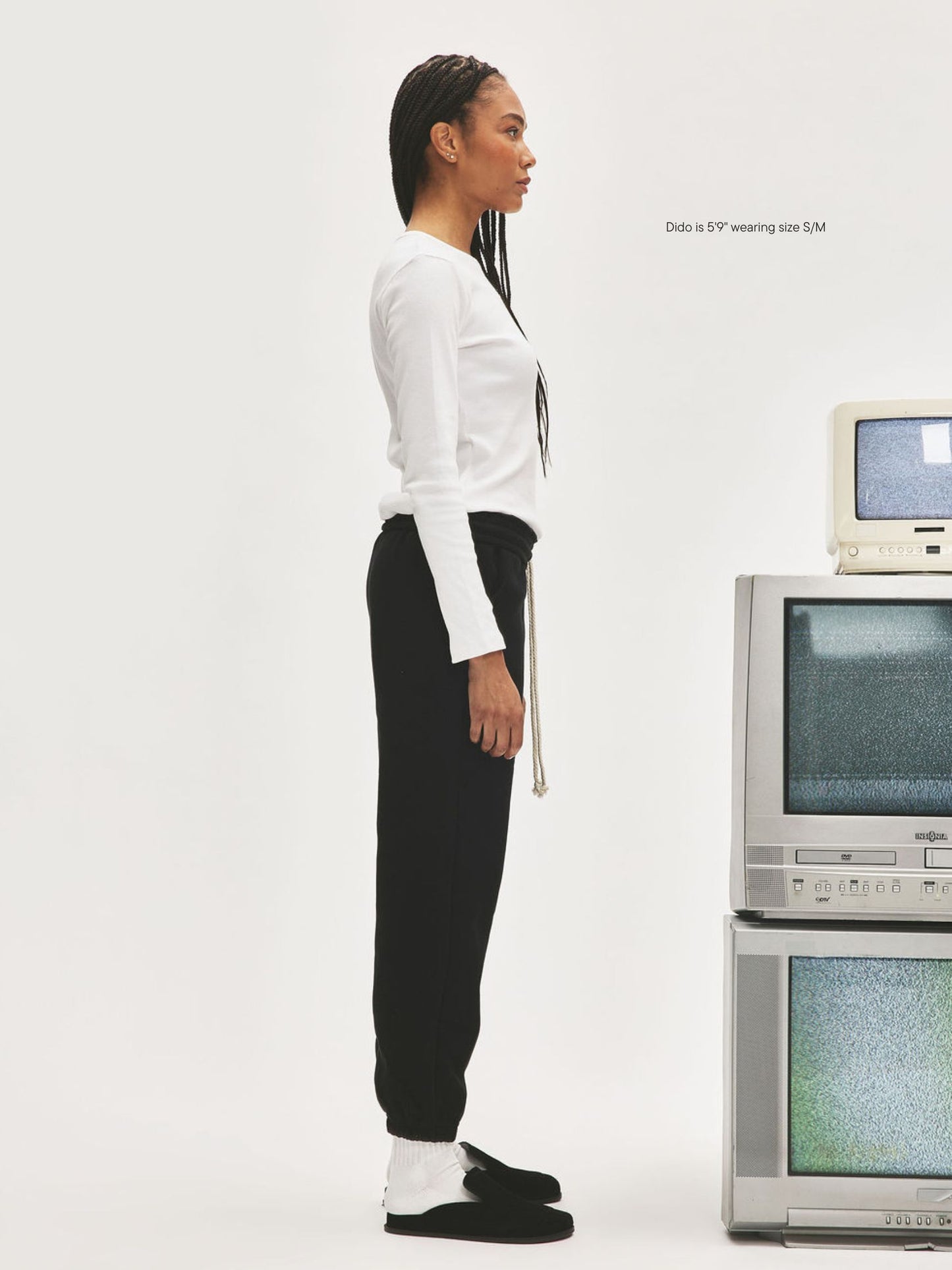 girl wearing Nostalgia Unisex Sweats -black