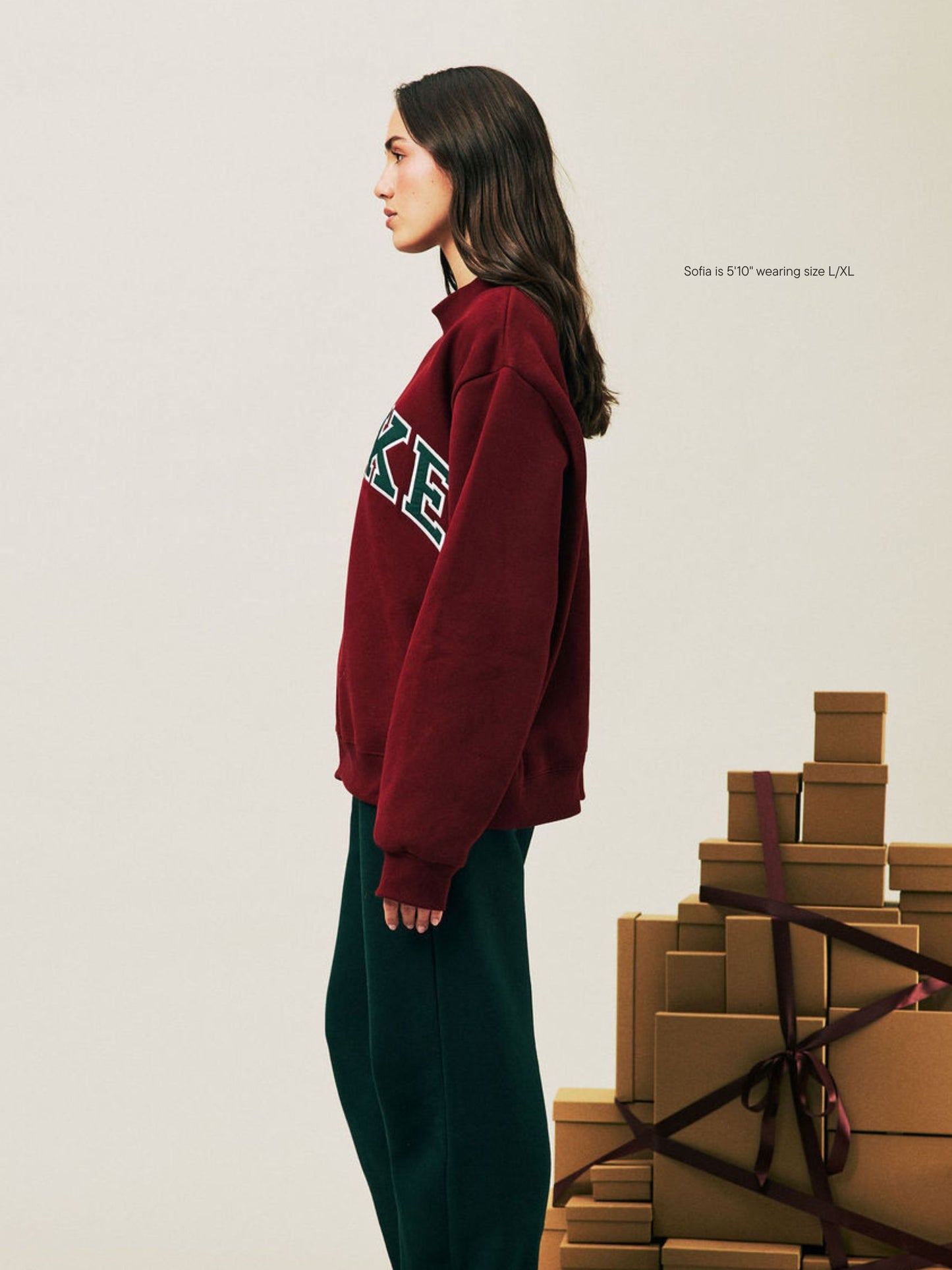 girl wearing Holiday Varsity Mockneck -maroon + forest