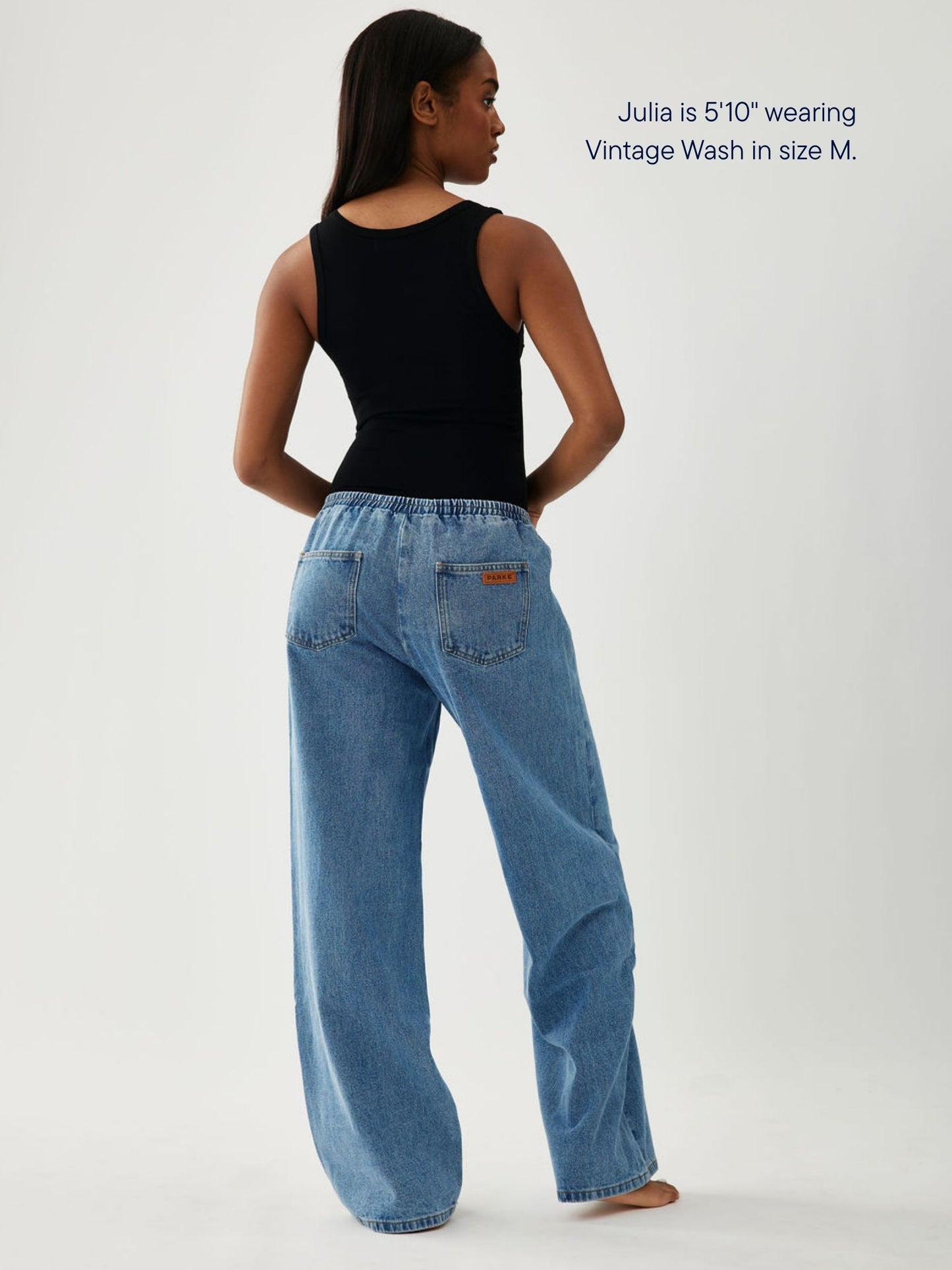 girl wearing elastic denim pant -vintage wash