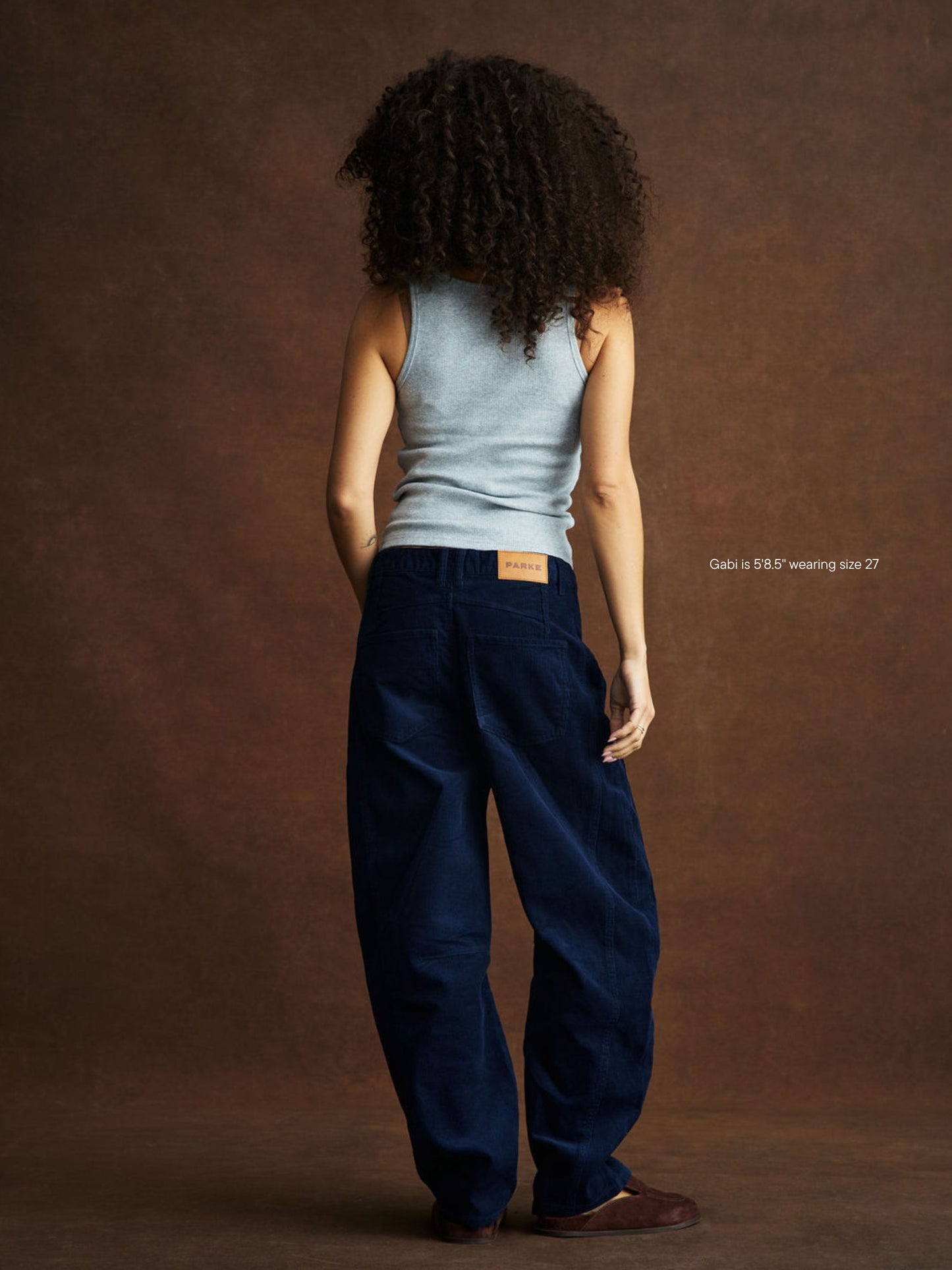 girl wearing Horseshoe Pants -navy corduroy