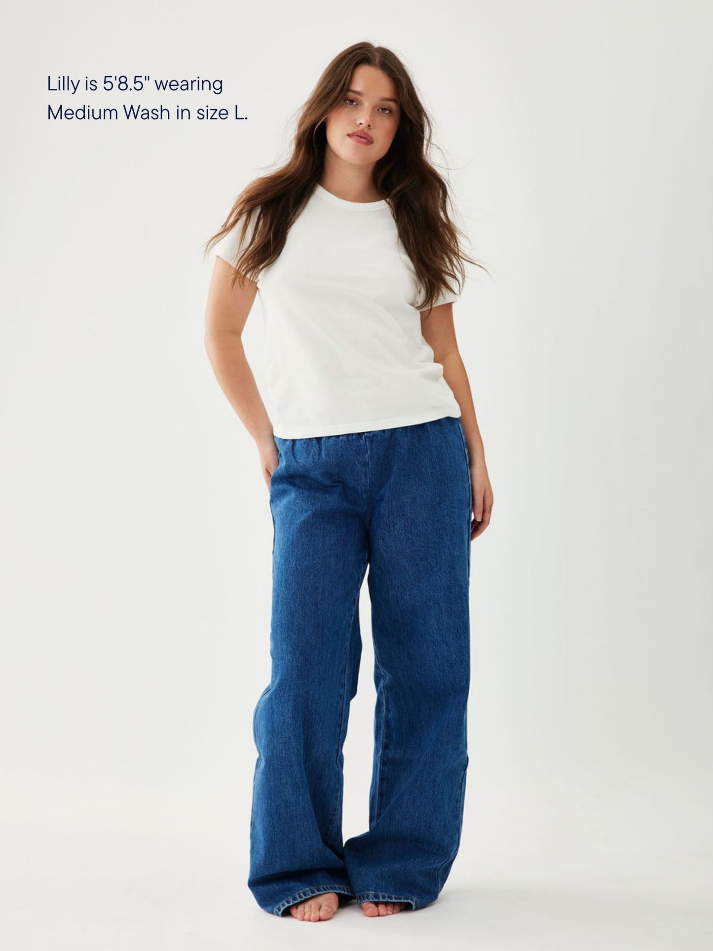 girl wearing elastic denim pant -medium wash