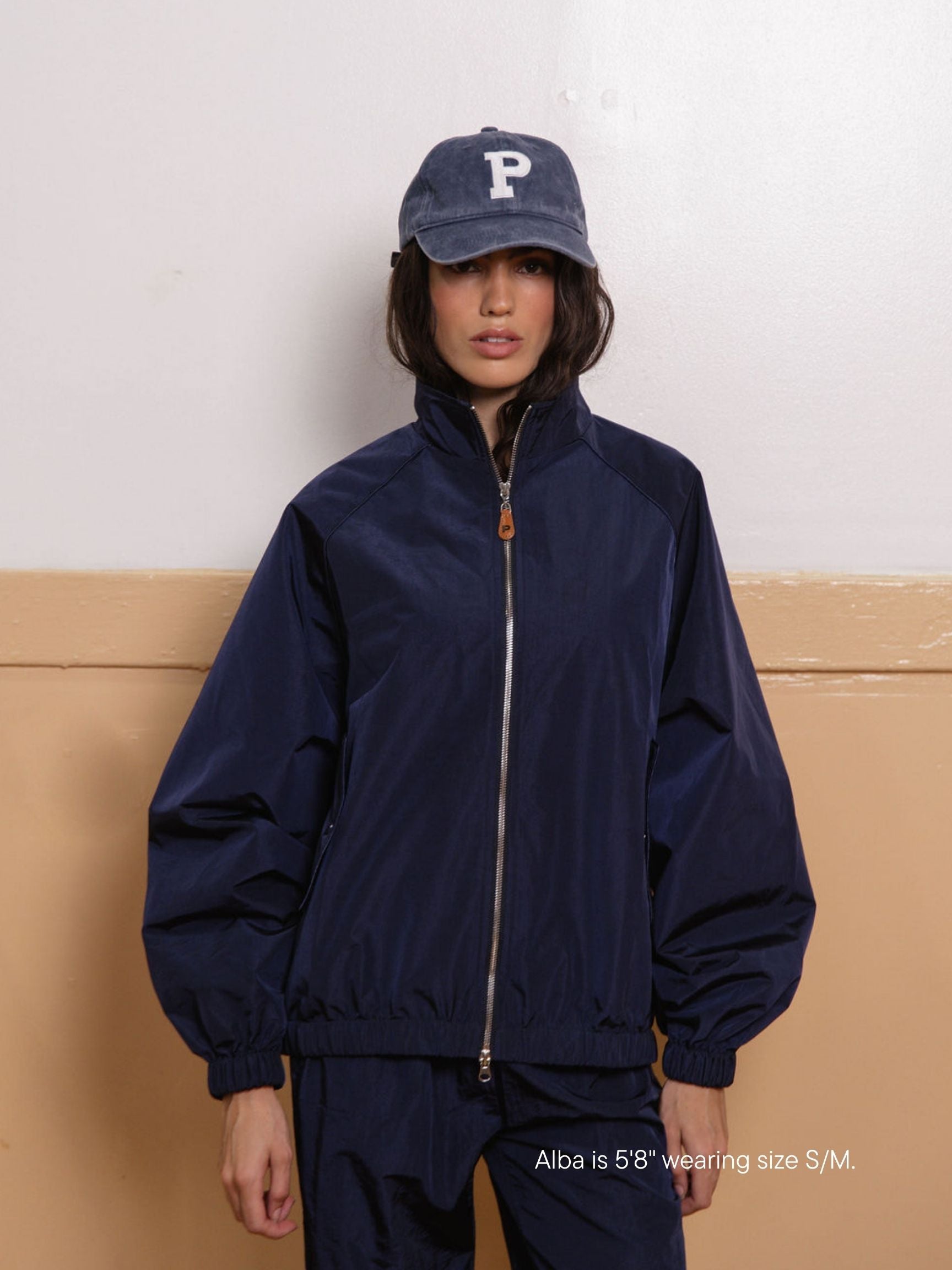 girl wearing nylon jacket -navy