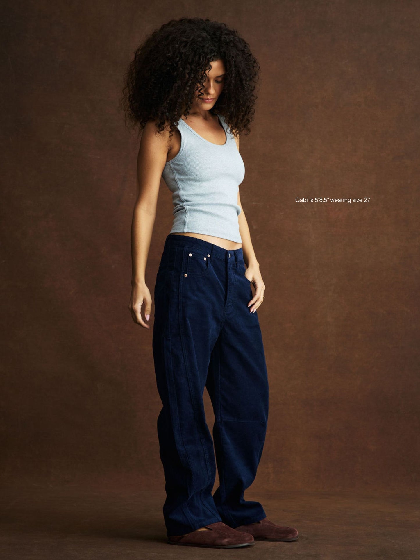 girl wearing Horseshoe Pants -navy corduroy
