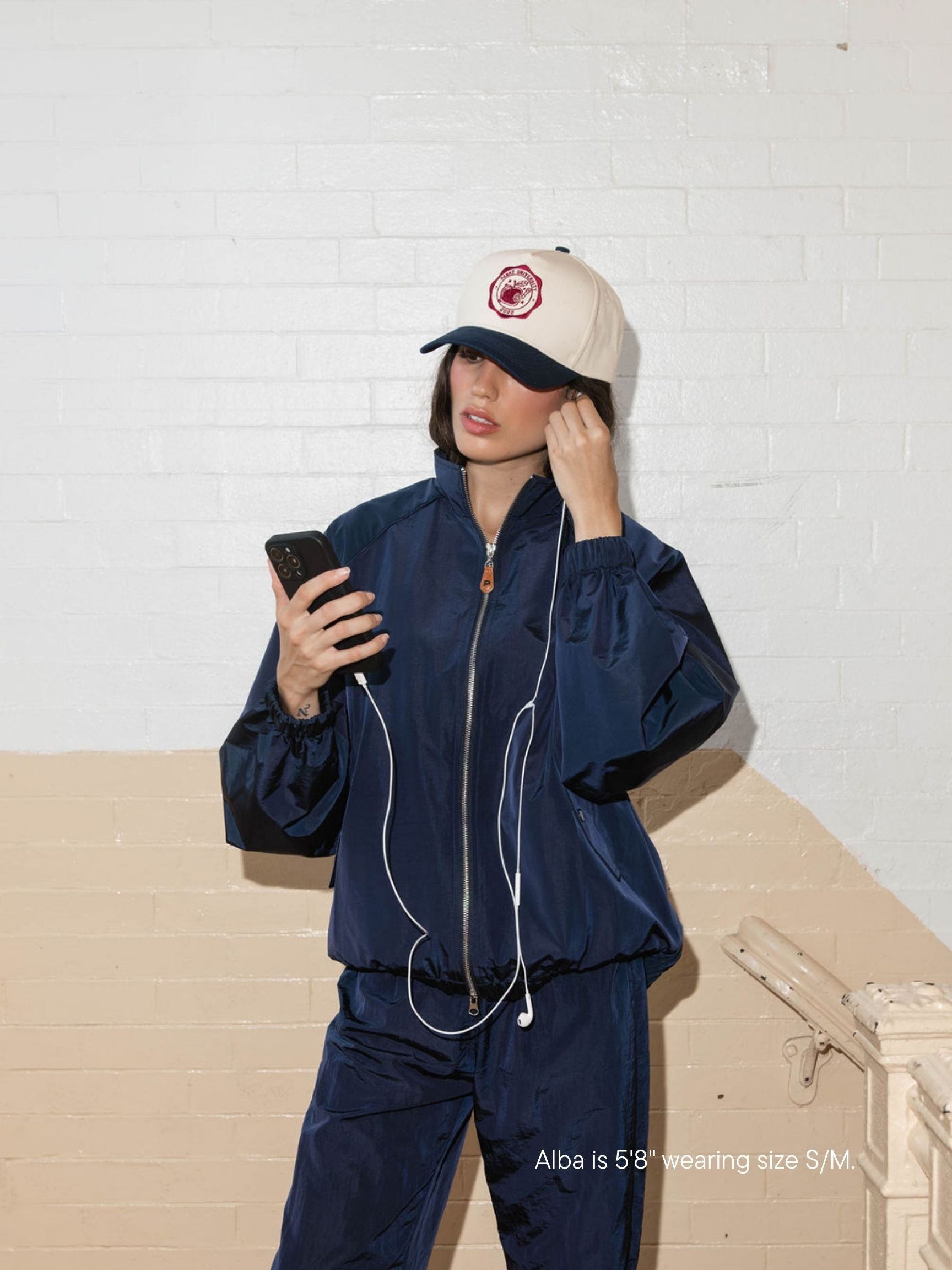 girl wearing nylon jacket -navy