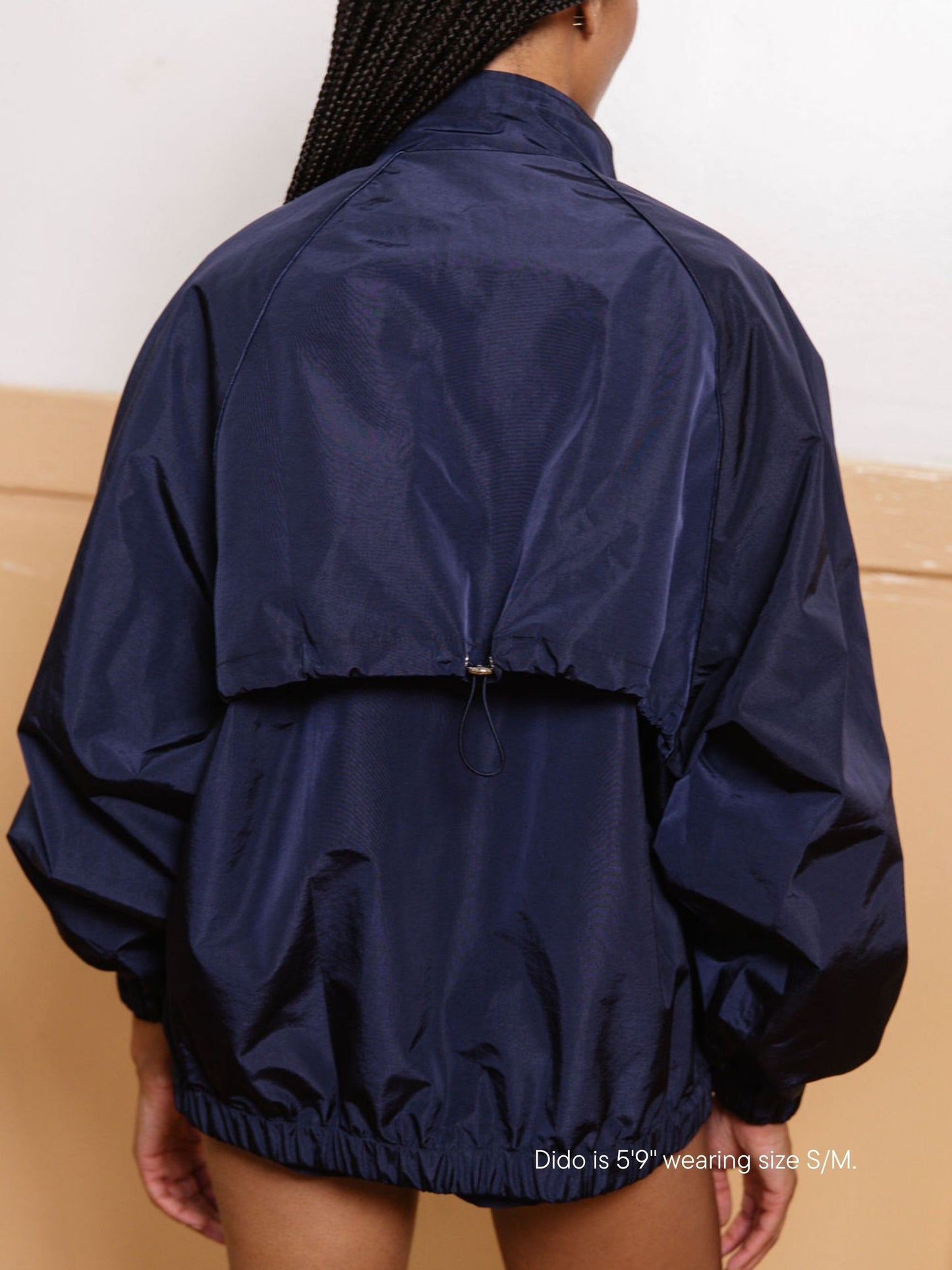 girl wearing nylon jacket -navy