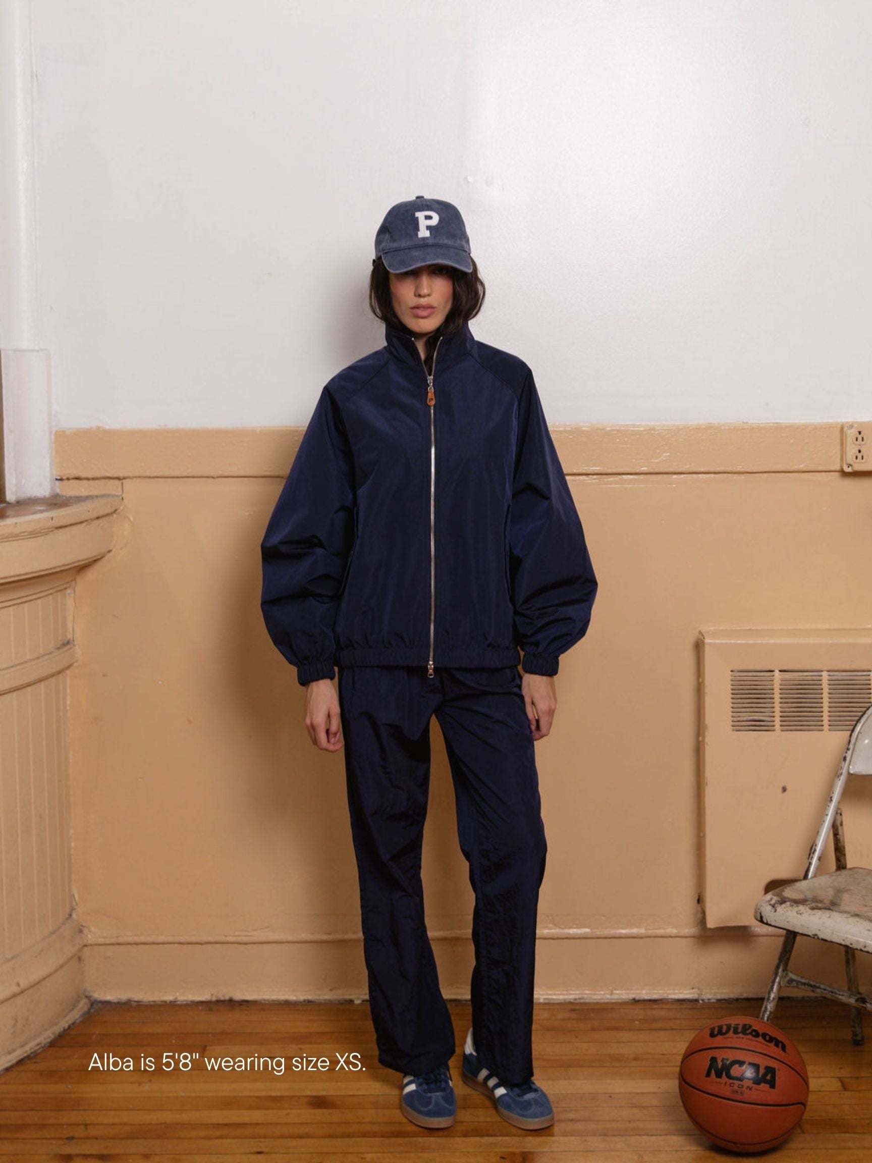 girl wearing nylon pants -navy