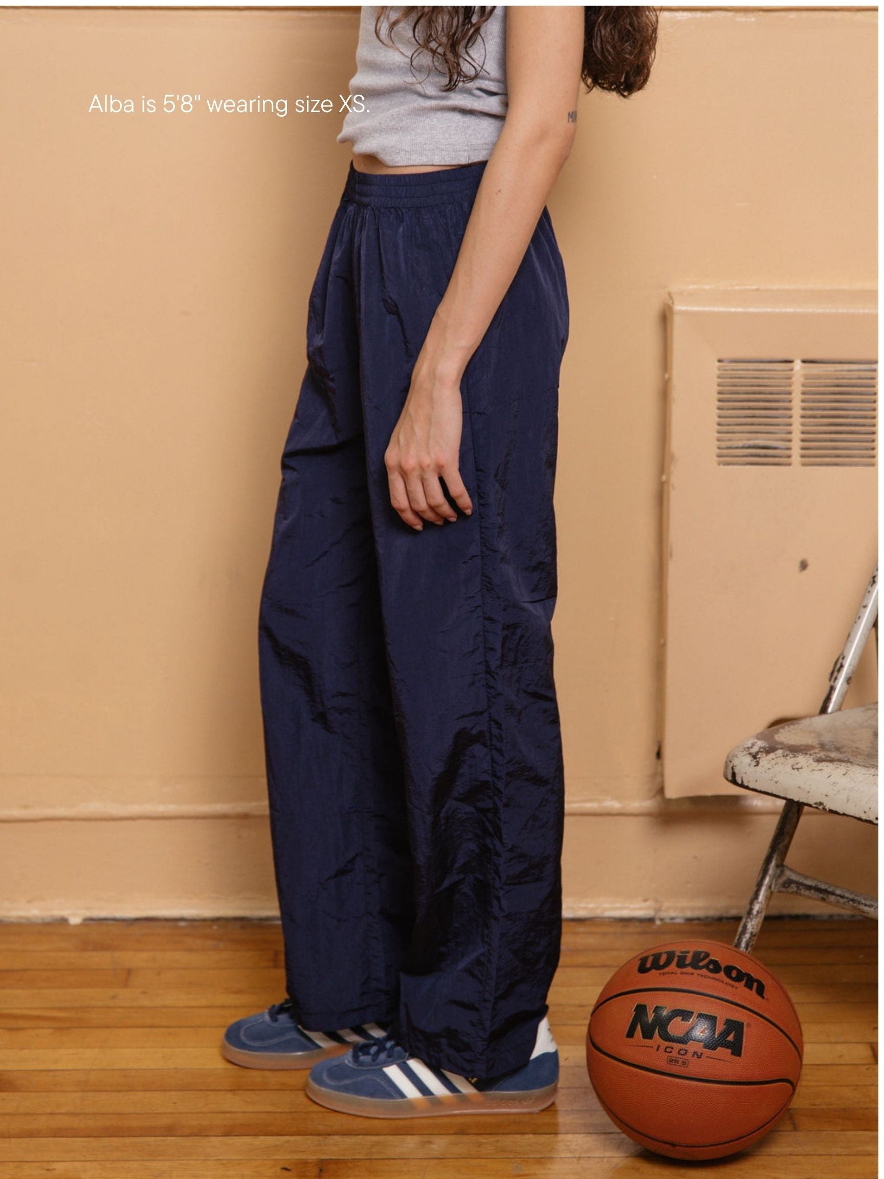 girl wearing nylon pants -navy