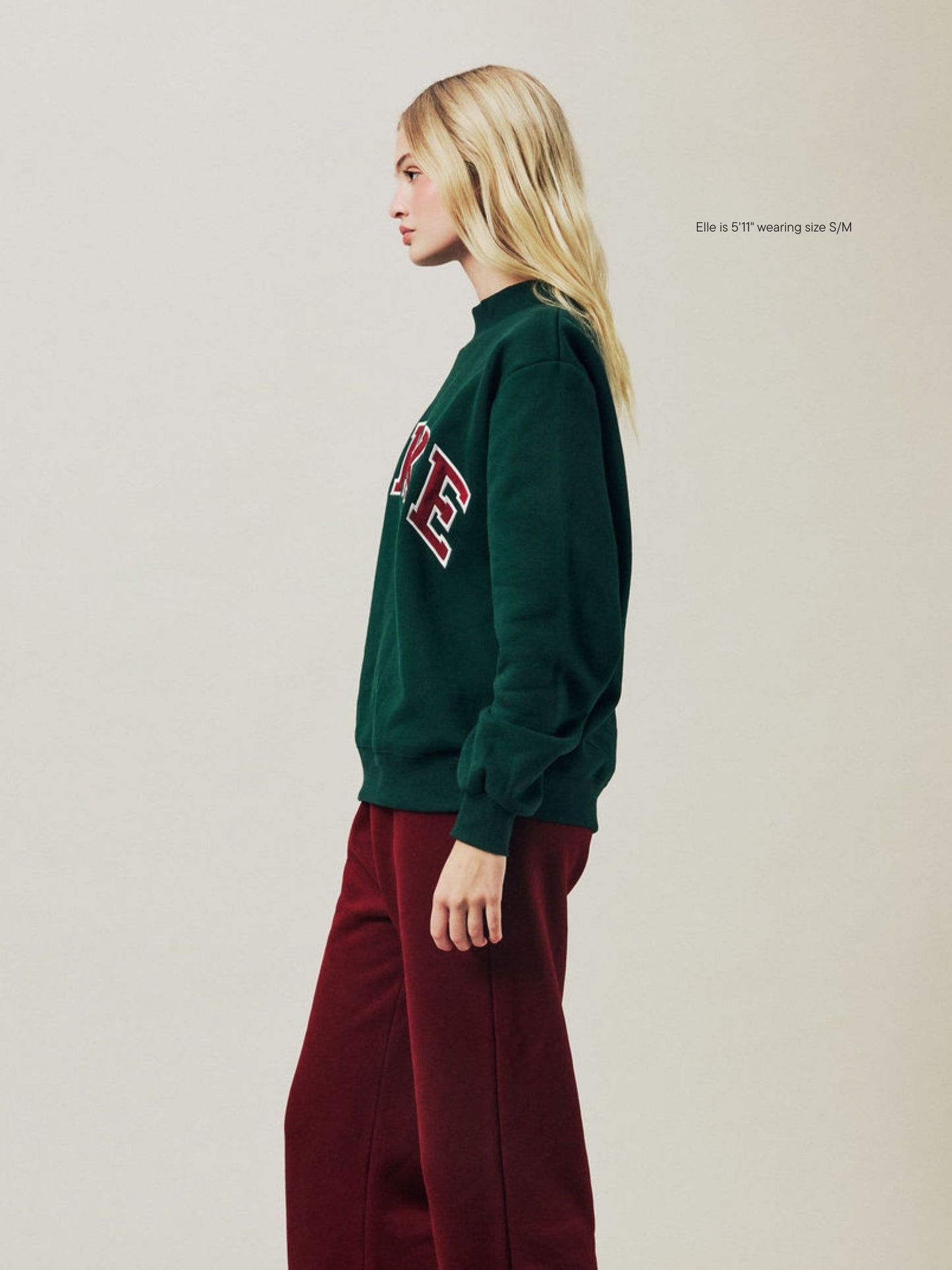 girl wearing Holiday Varsity Mockneck -forest + maroon 