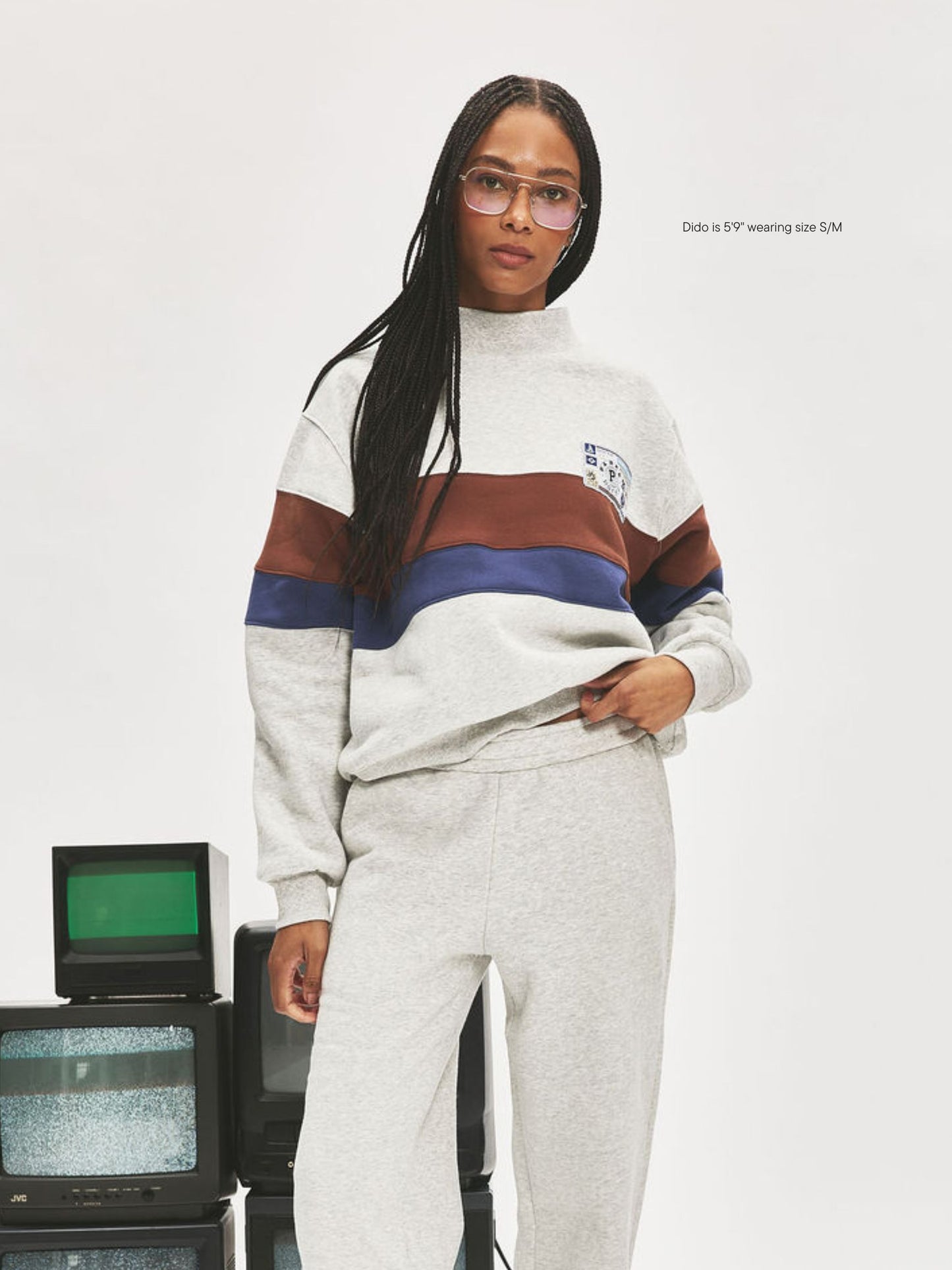 girl wearing Vintage Striped Mockneck With Nostalgia Patch -classic grey