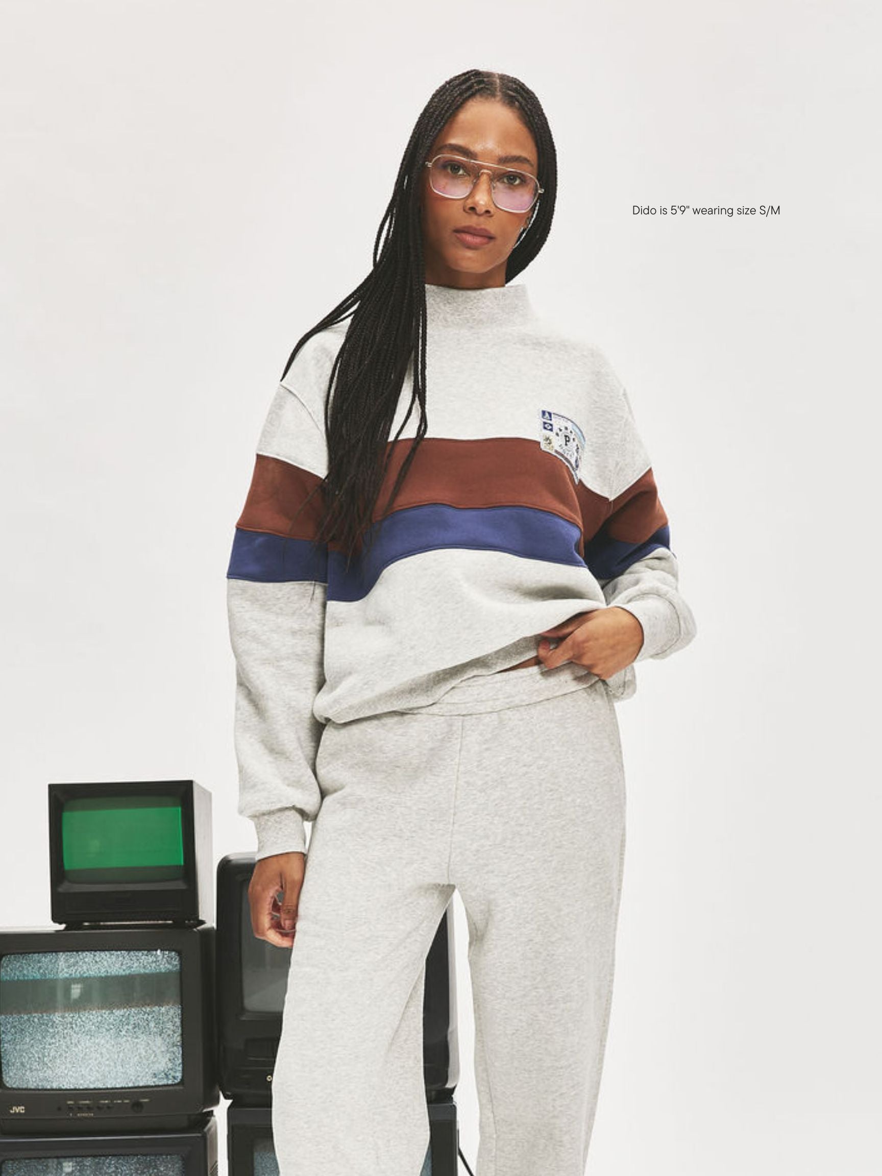 girl wearing Vintage Striped Mockneck With Nostalgia Patch -classic grey