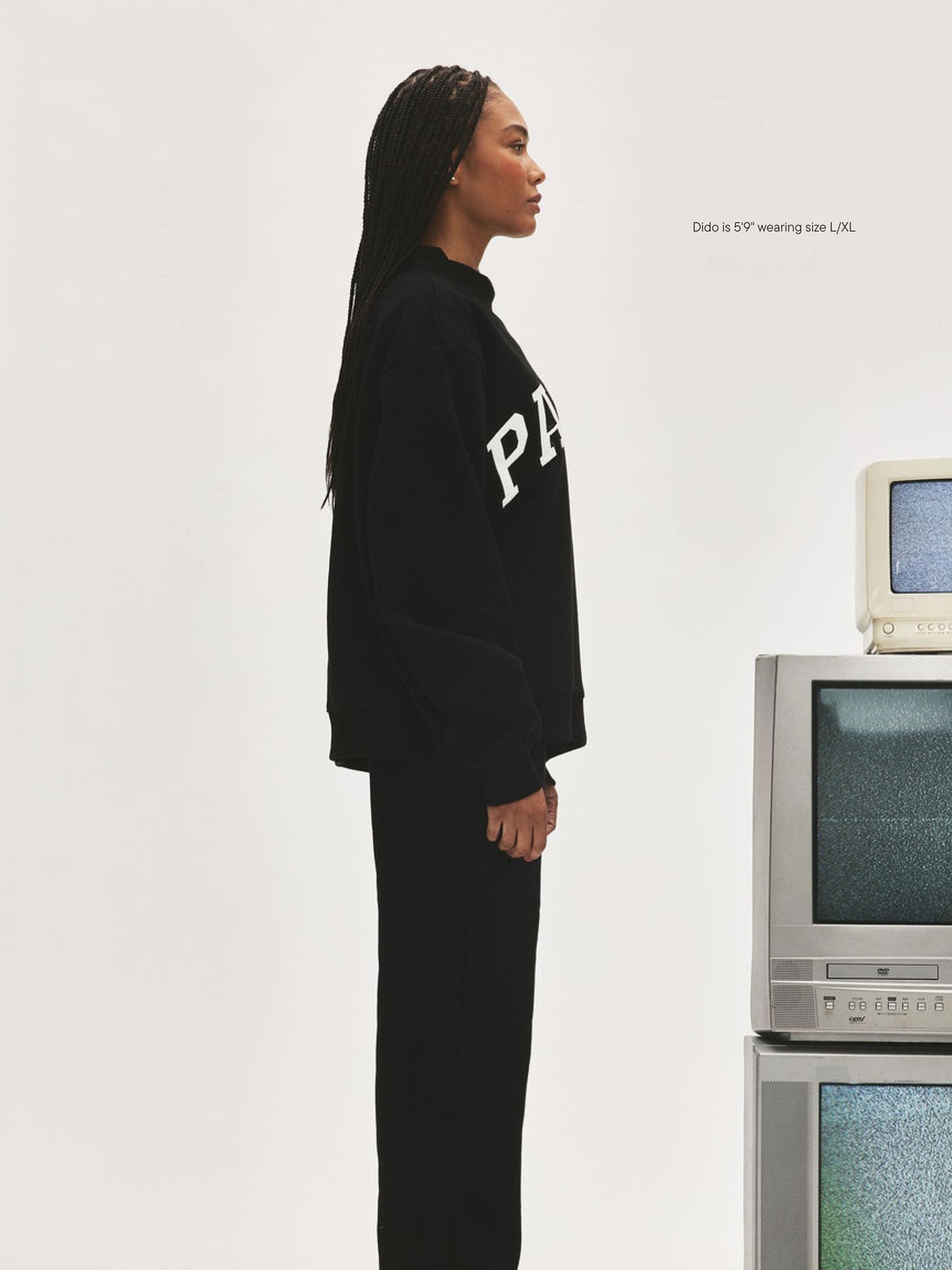 girl wearing Nostalgia Varsity Mockneck -black + white (black thread)