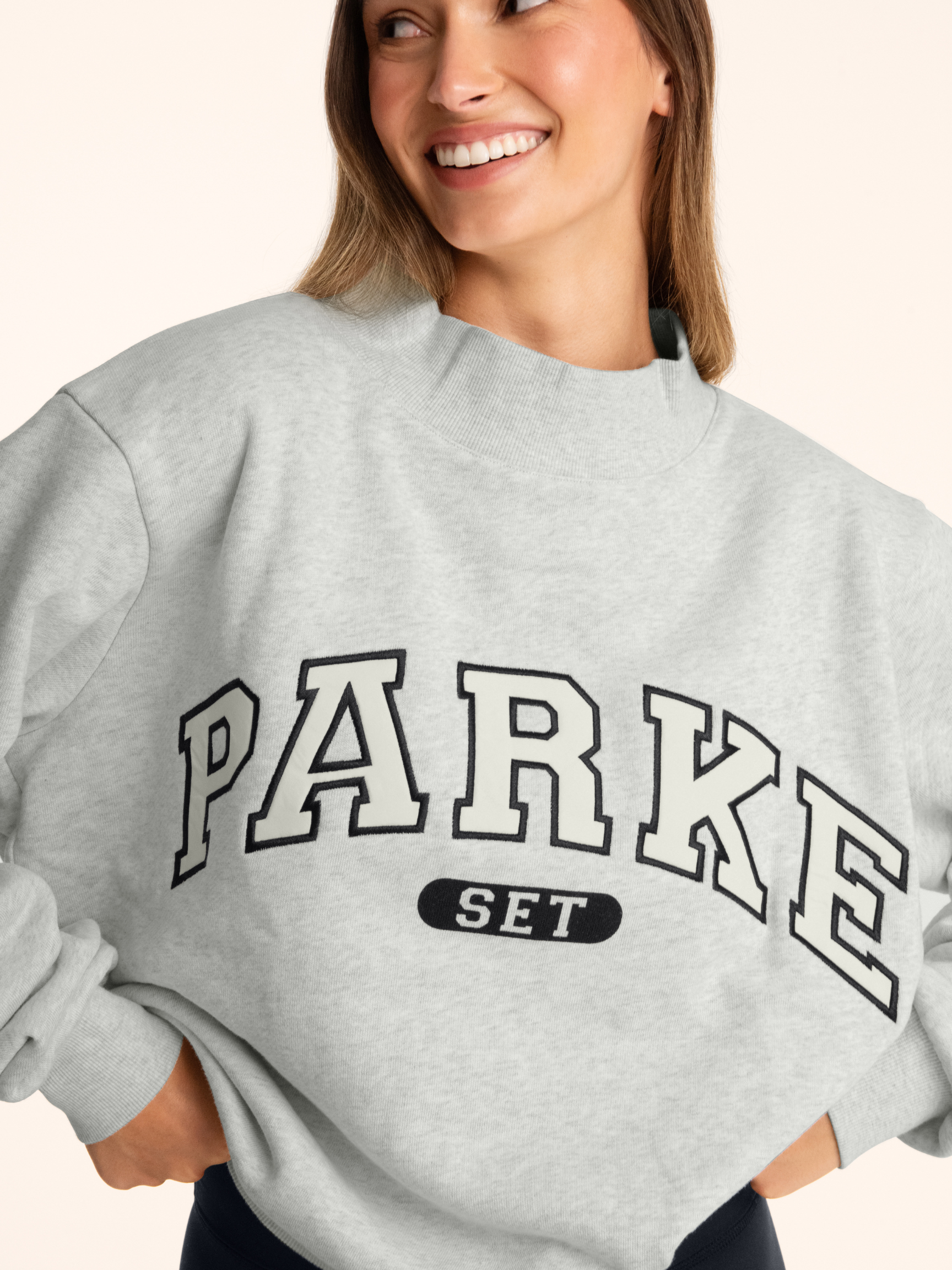 girl wearing Parke x SET Varsity Mockneck -ocra