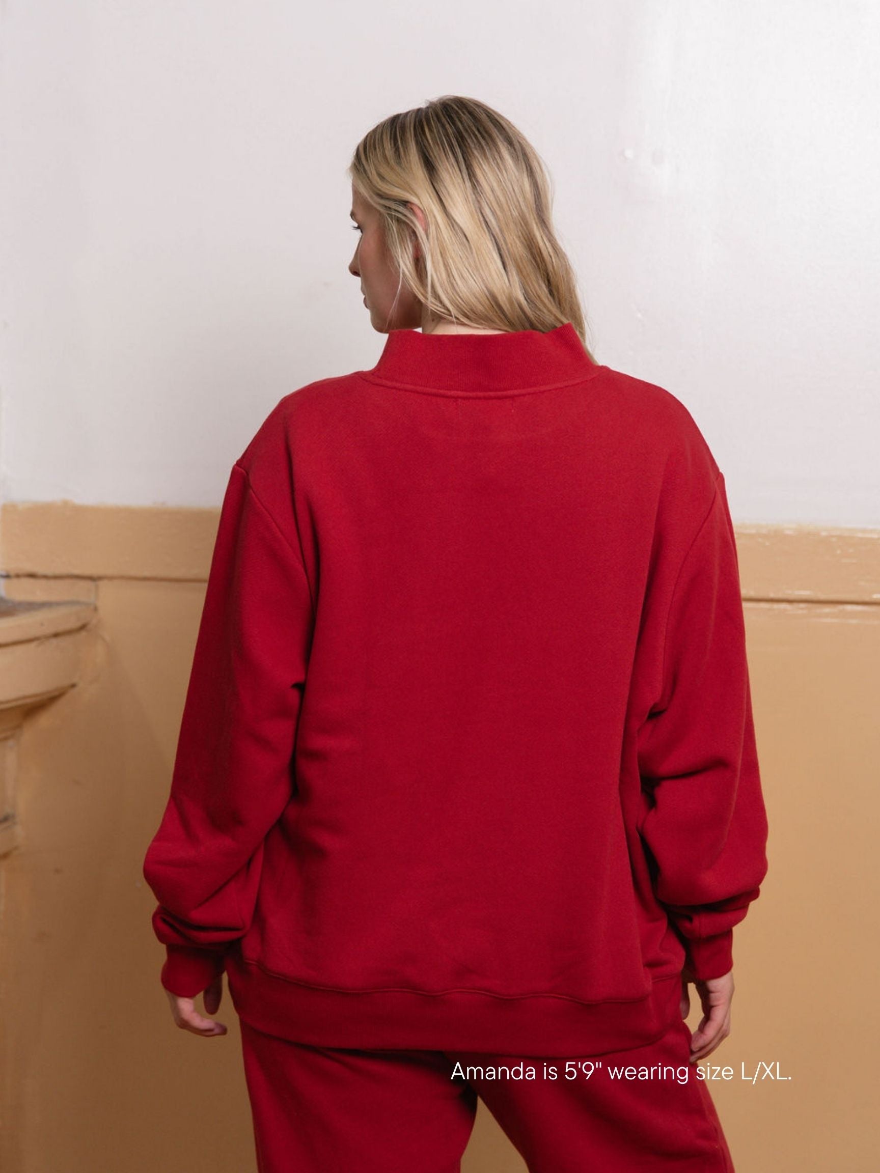 girl wearing back to school varsity mockneck -crimson + white