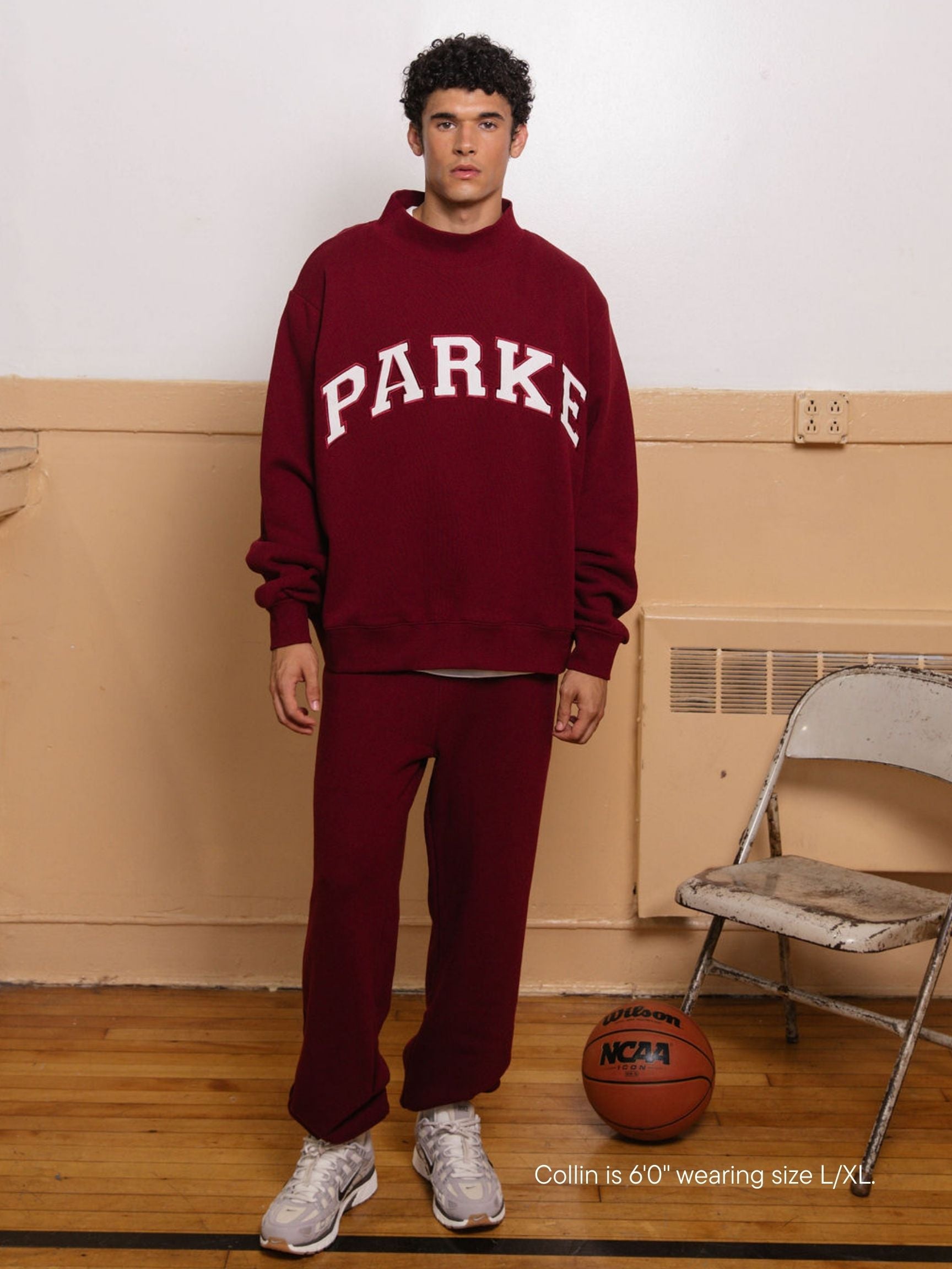 boy wearing back to school varsity mockneck -maroon + white