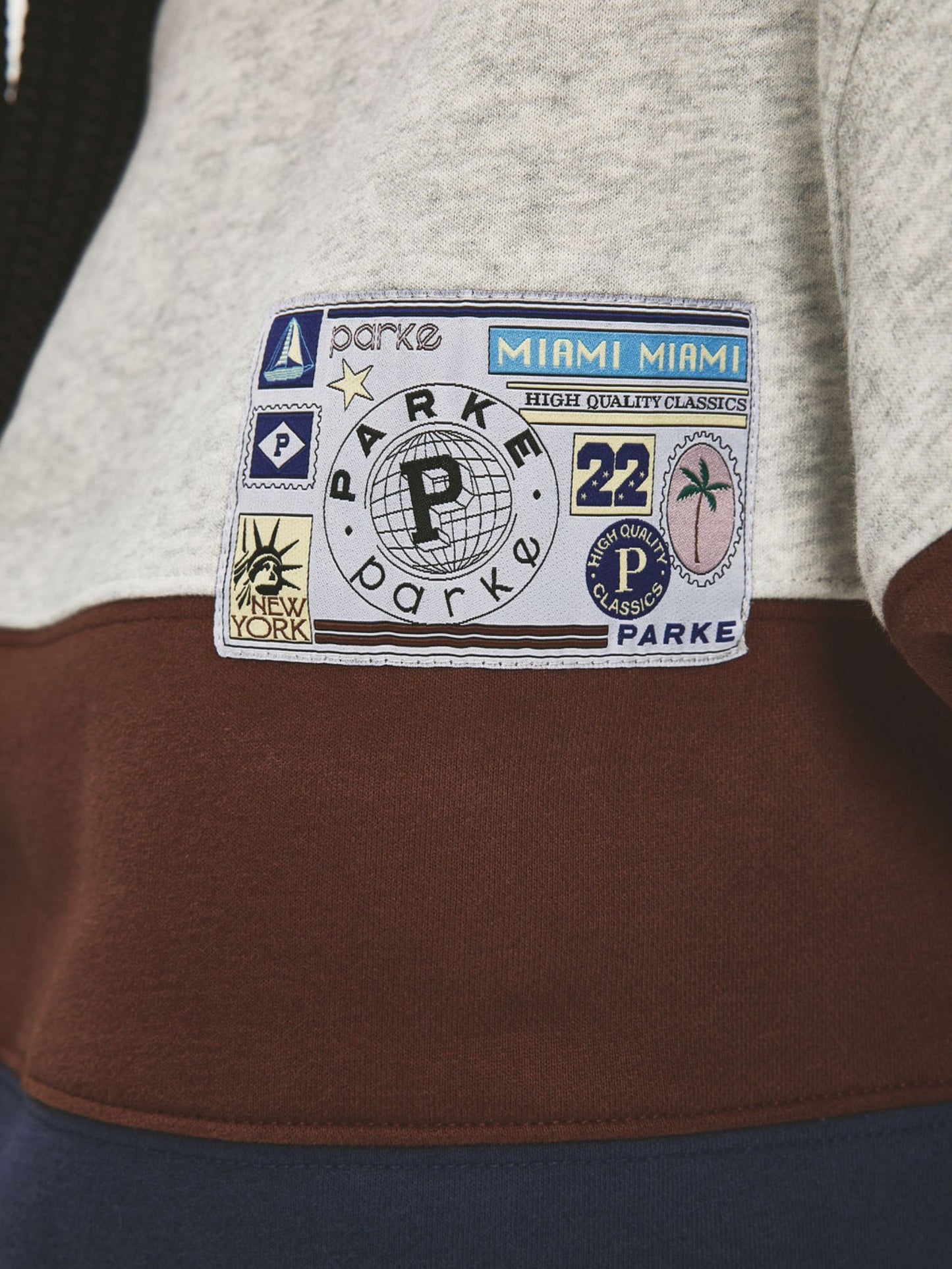 girl wearing Vintage Striped Mockneck With Nostalgia Patch -classic grey