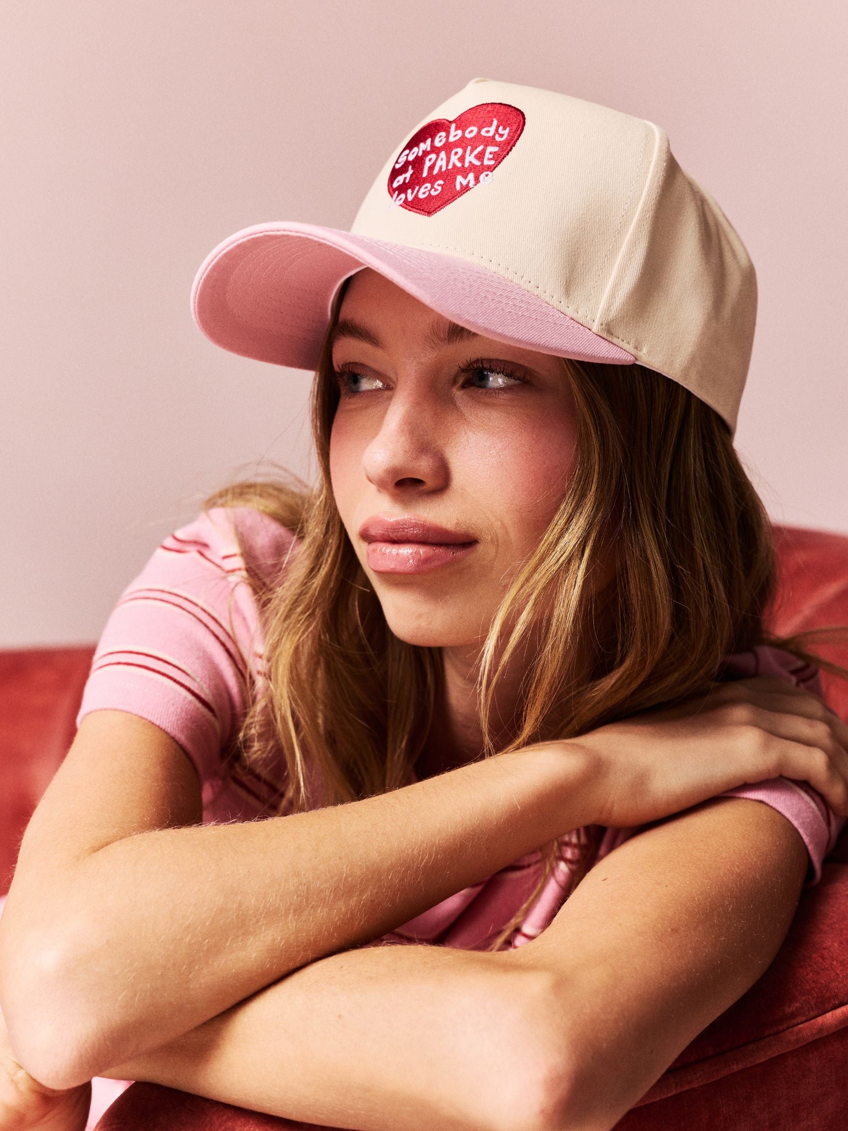 girl wearing Somebody Loves Me Hat -pink