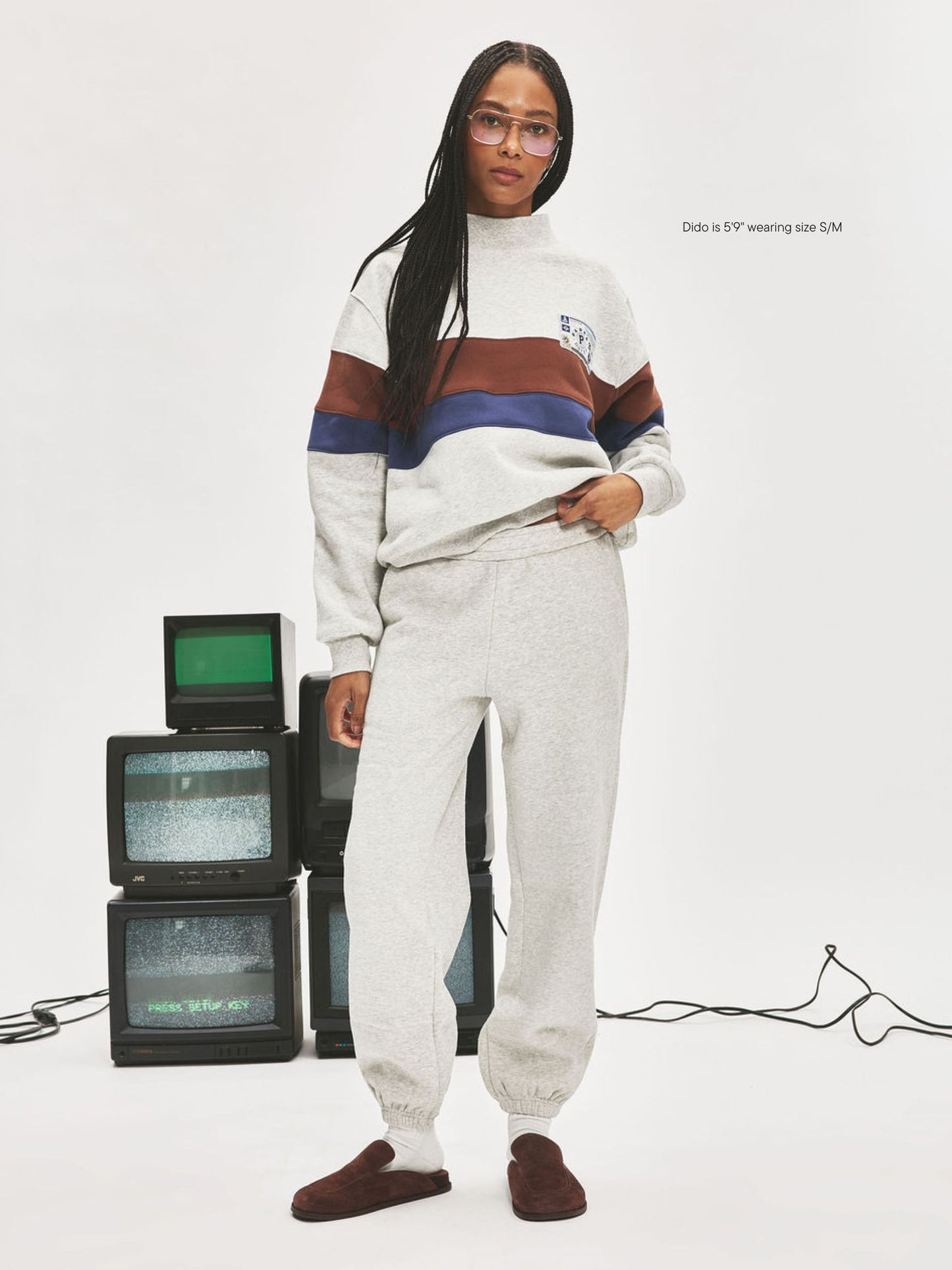 girl wearing Nostalgia Unisex Sweats -classic grey