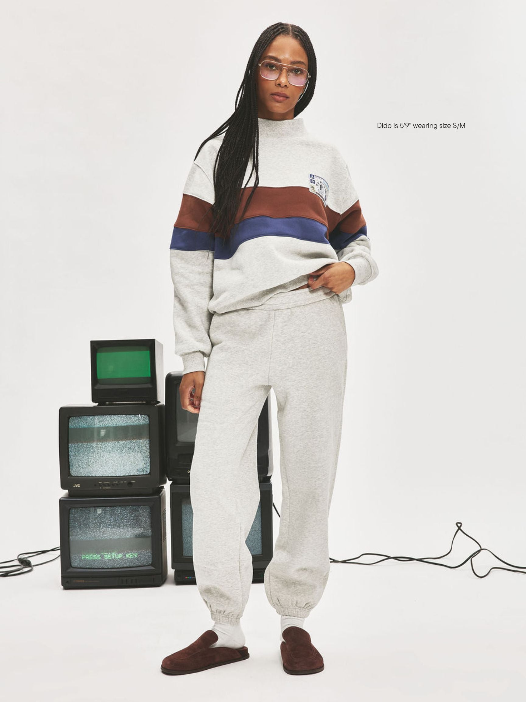 girl wearing Nostalgia Unisex Sweats -classic grey