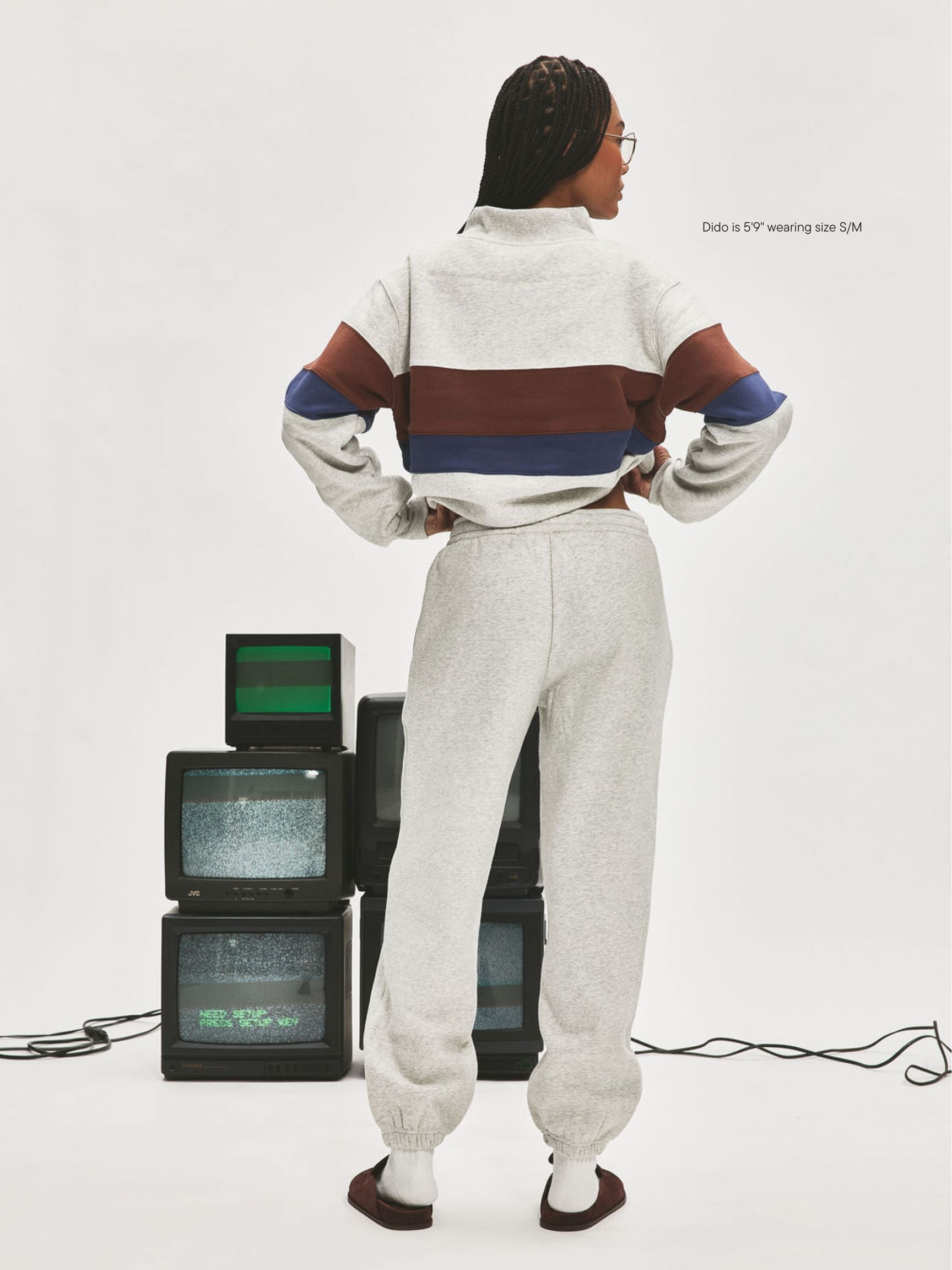 girl wearing Nostalgia Unisex Sweats -classic grey