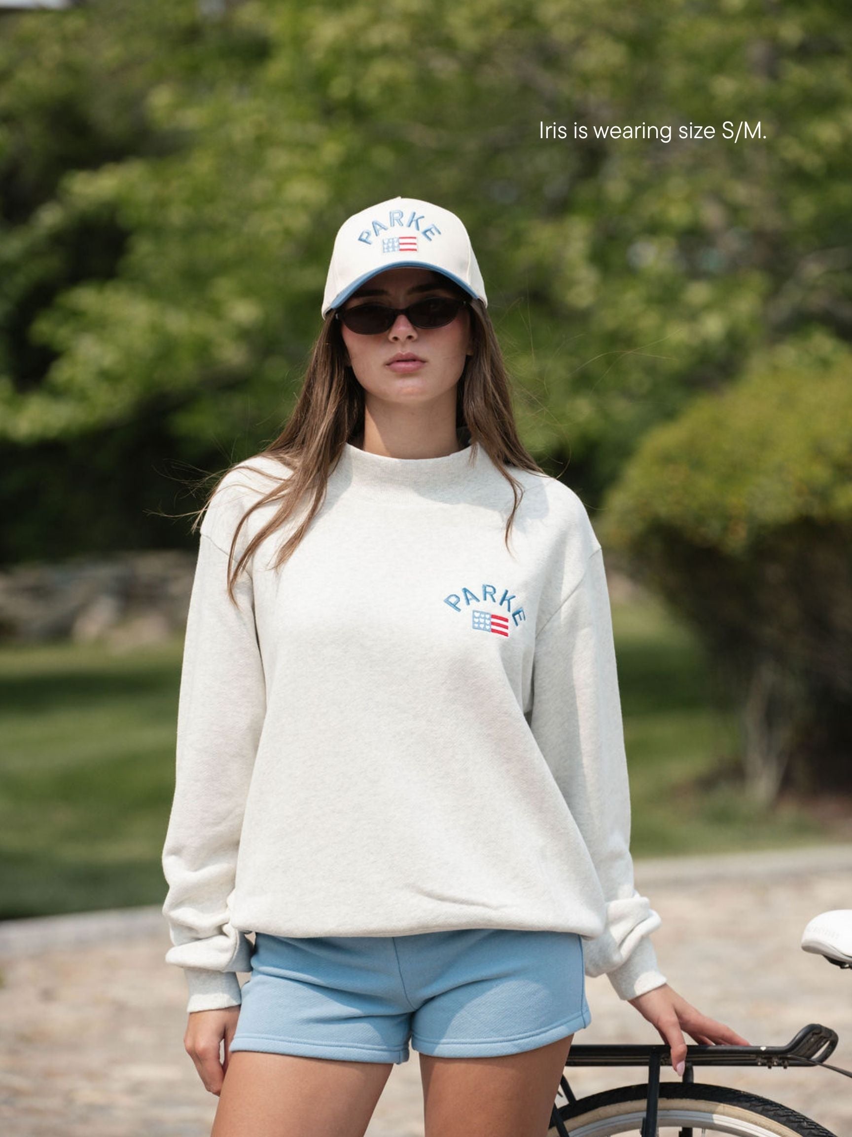 girl wearing flag mockneck -heather grey