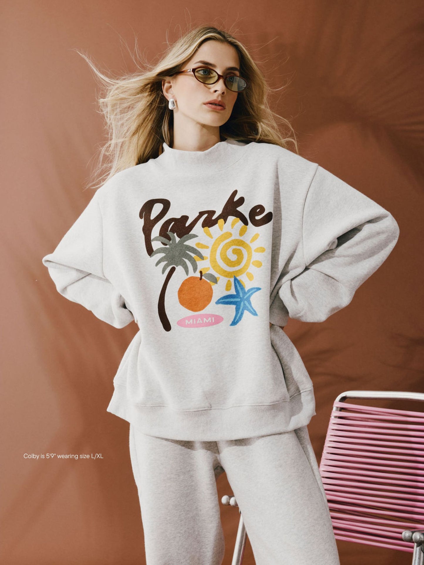 girl wearing Cities Graphic Mockneck -miami