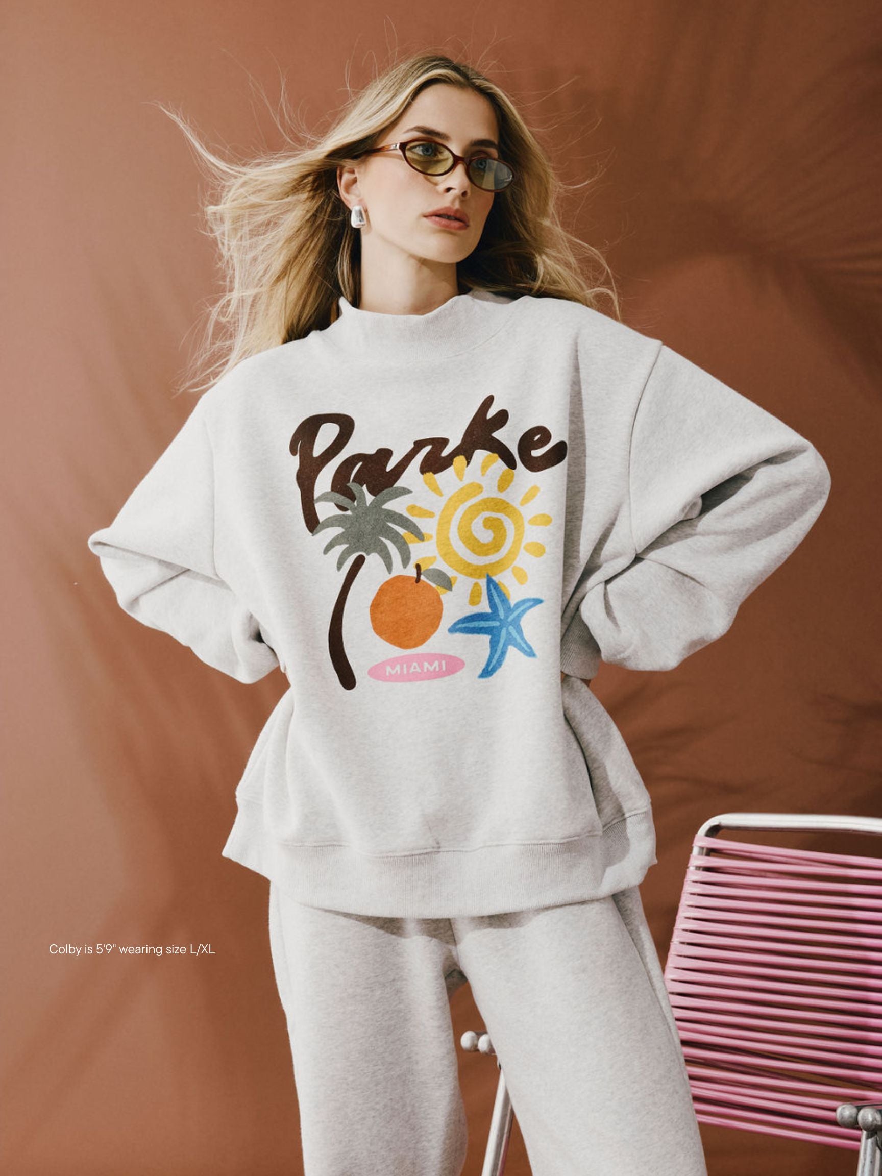 girl wearing Cities Graphic Mockneck -miami