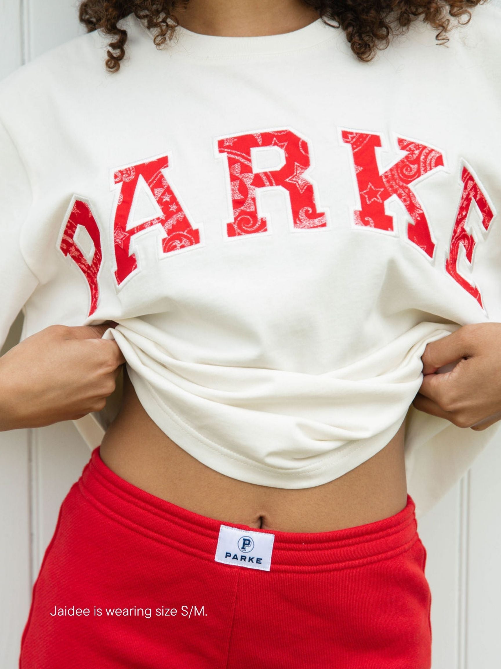 varsity tee -cream + red paisley