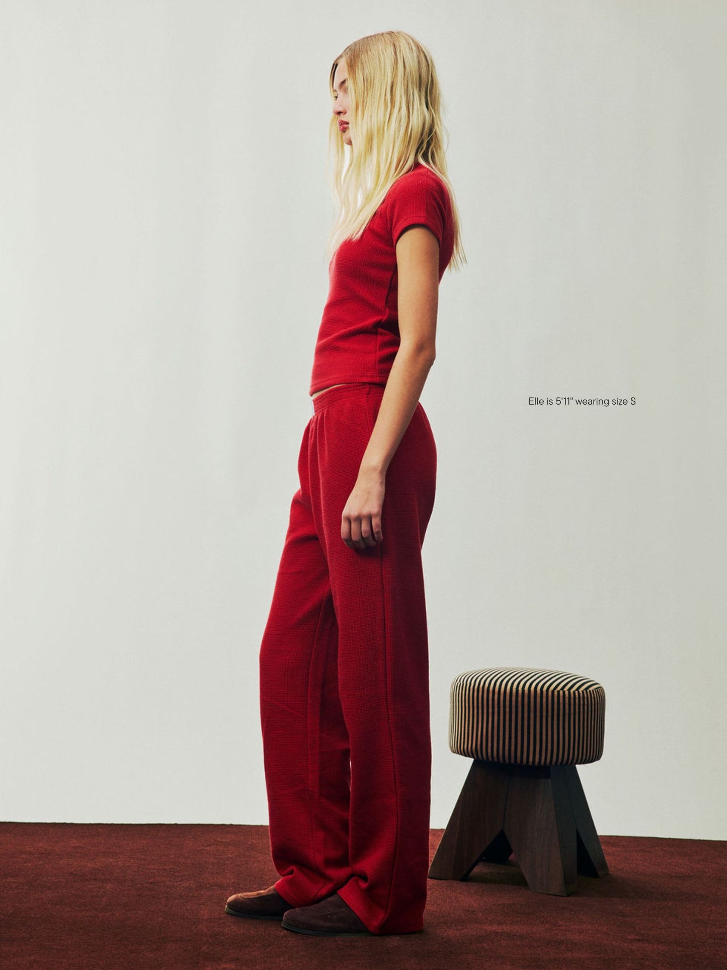 girl wearing Holiday Waffle Boxer Pants -cola