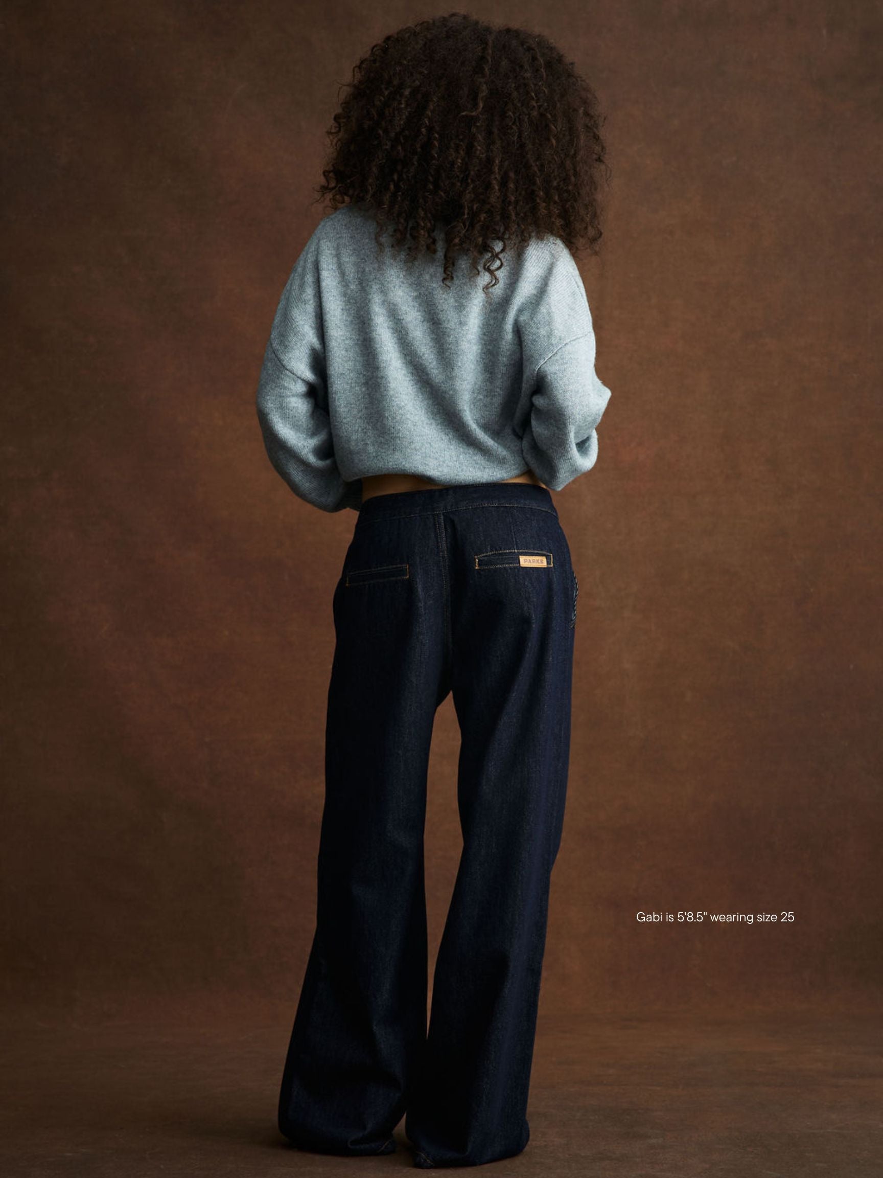 girl wearing trouser jean -dark wash
