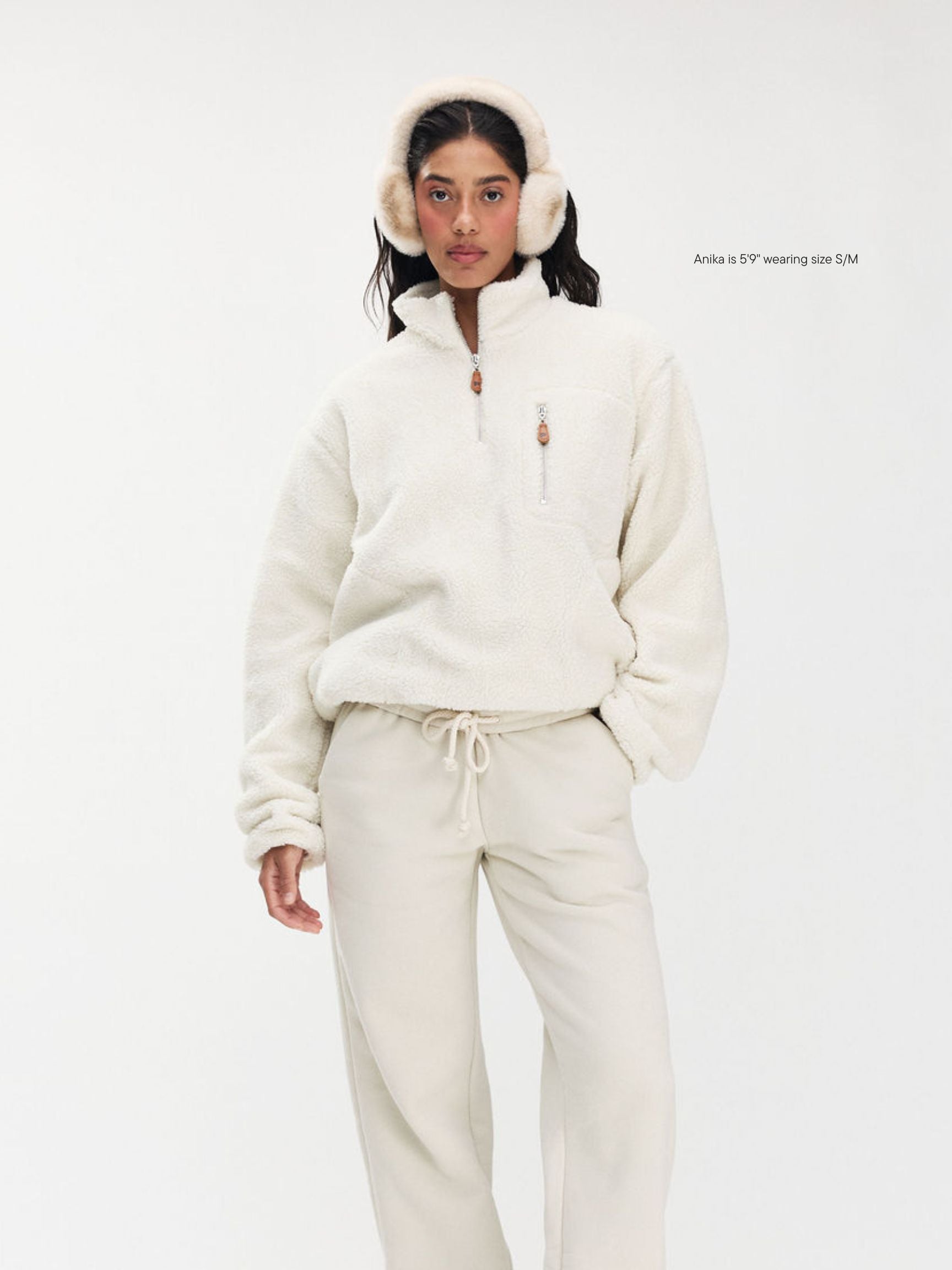 girl wearing Quarter Zip Fleece Pullover -oat