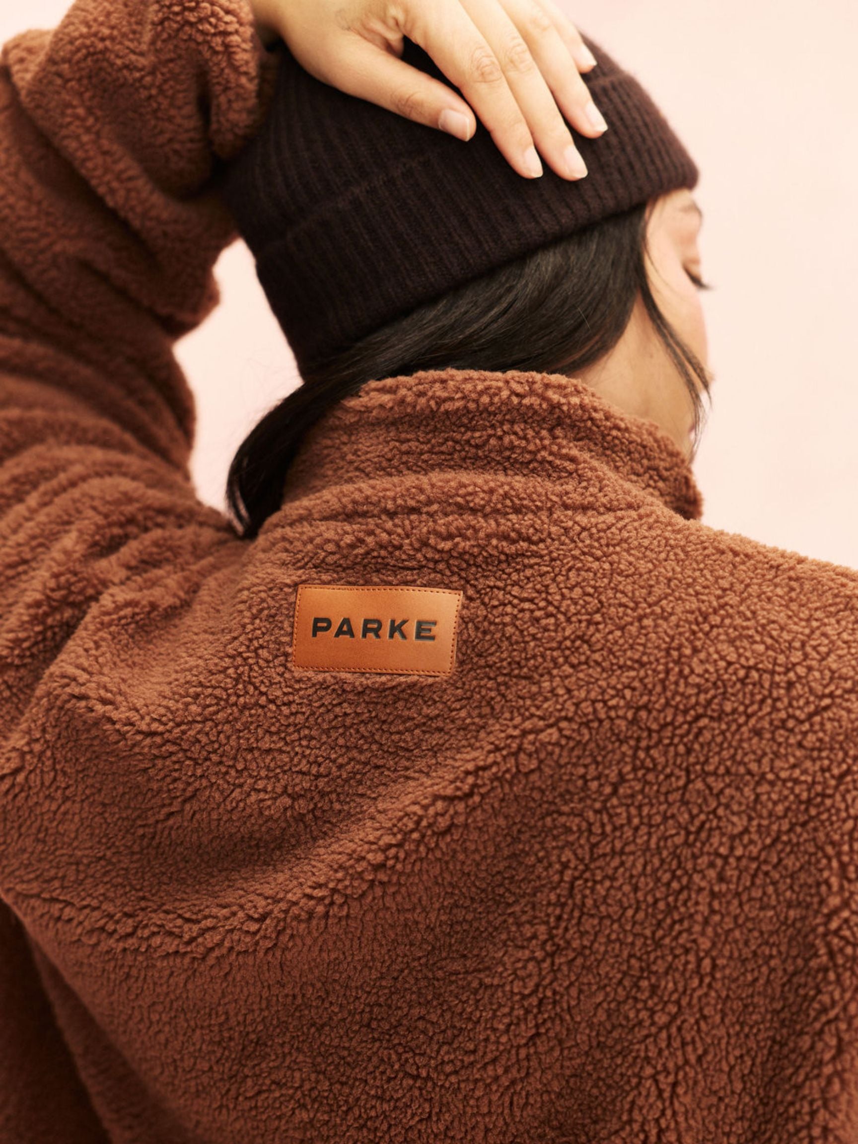 girl wearing Quarter Zip Fleece Pullover -mocha