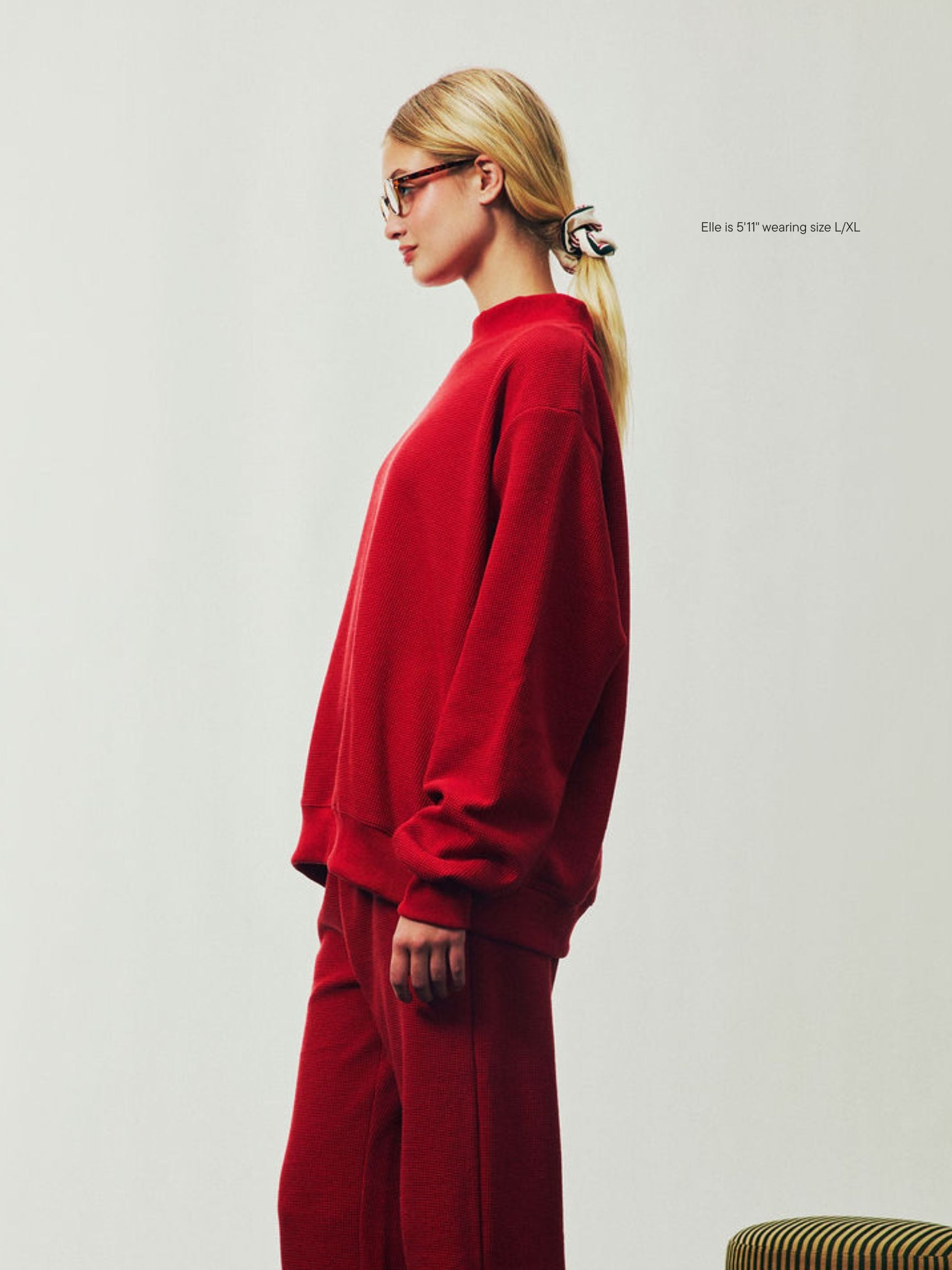 girl wearing Holiday Waffle Pullover -cola