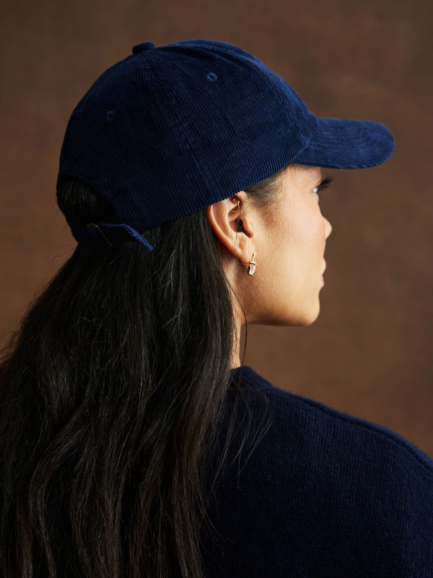 girl wearing Corduroy Baseball Hat -navy corduroy