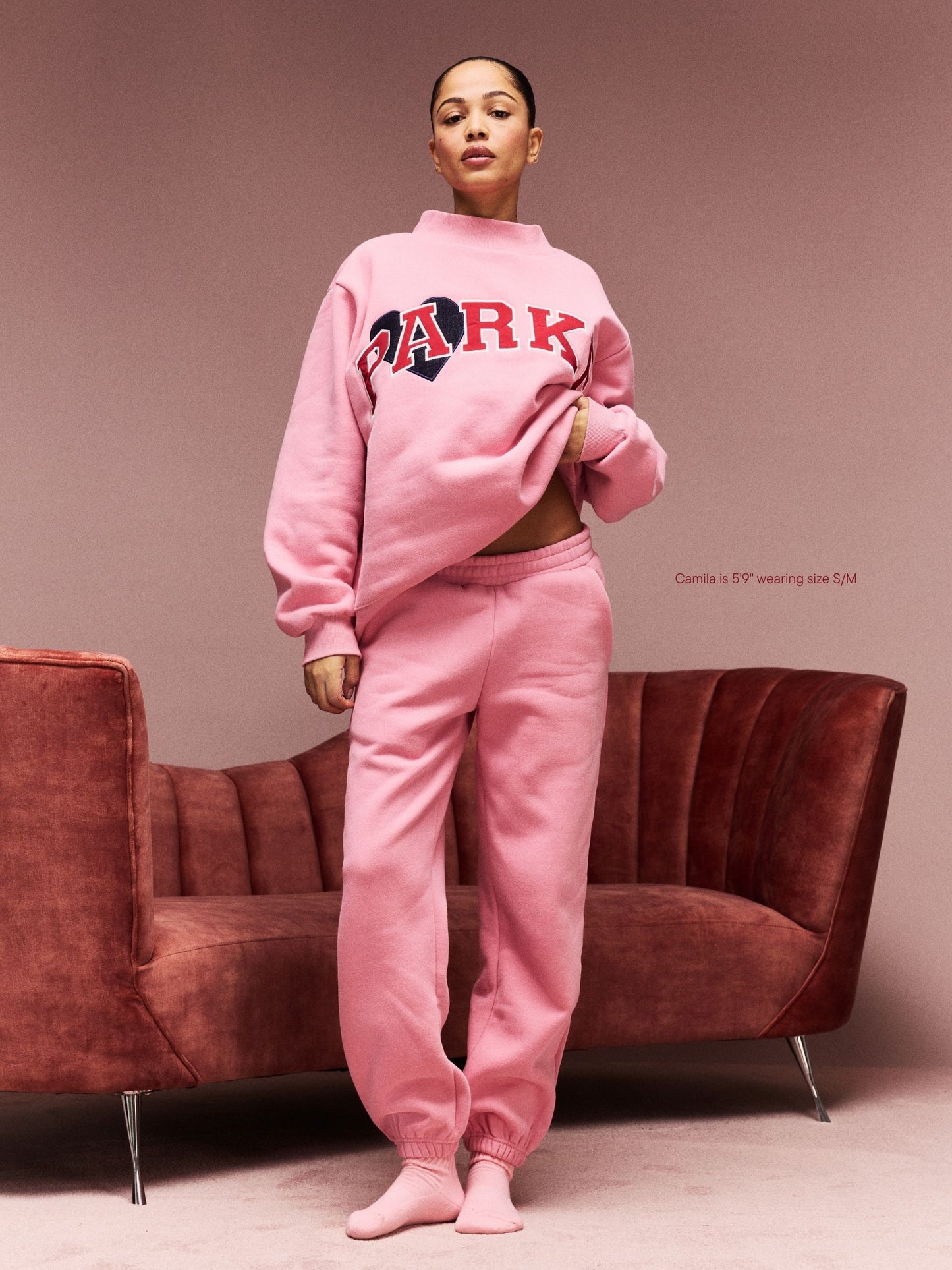 girl wearing Drawstring Unisex Sweatpants -blush