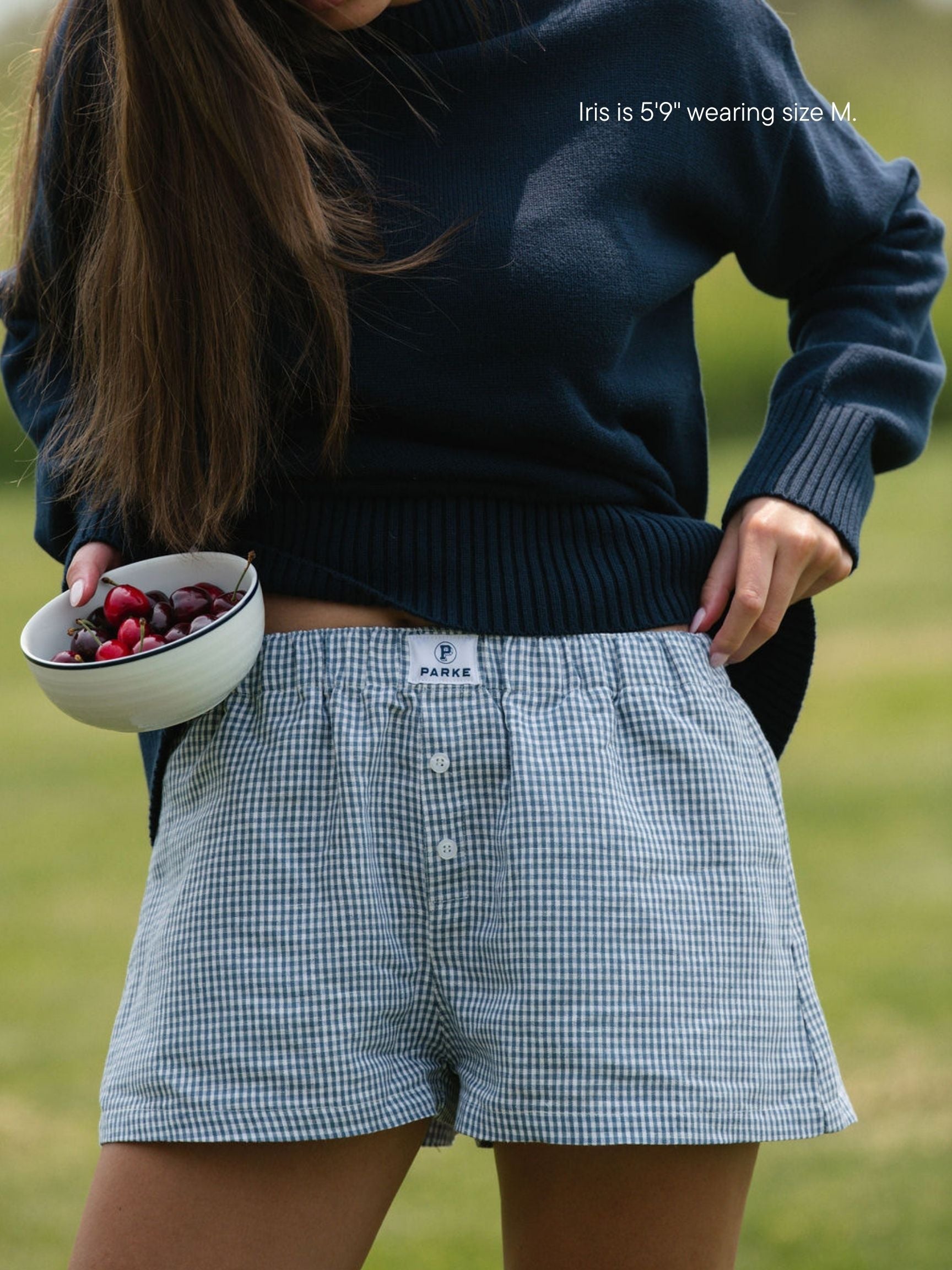 girl wearing linen boxer short -navy gingham