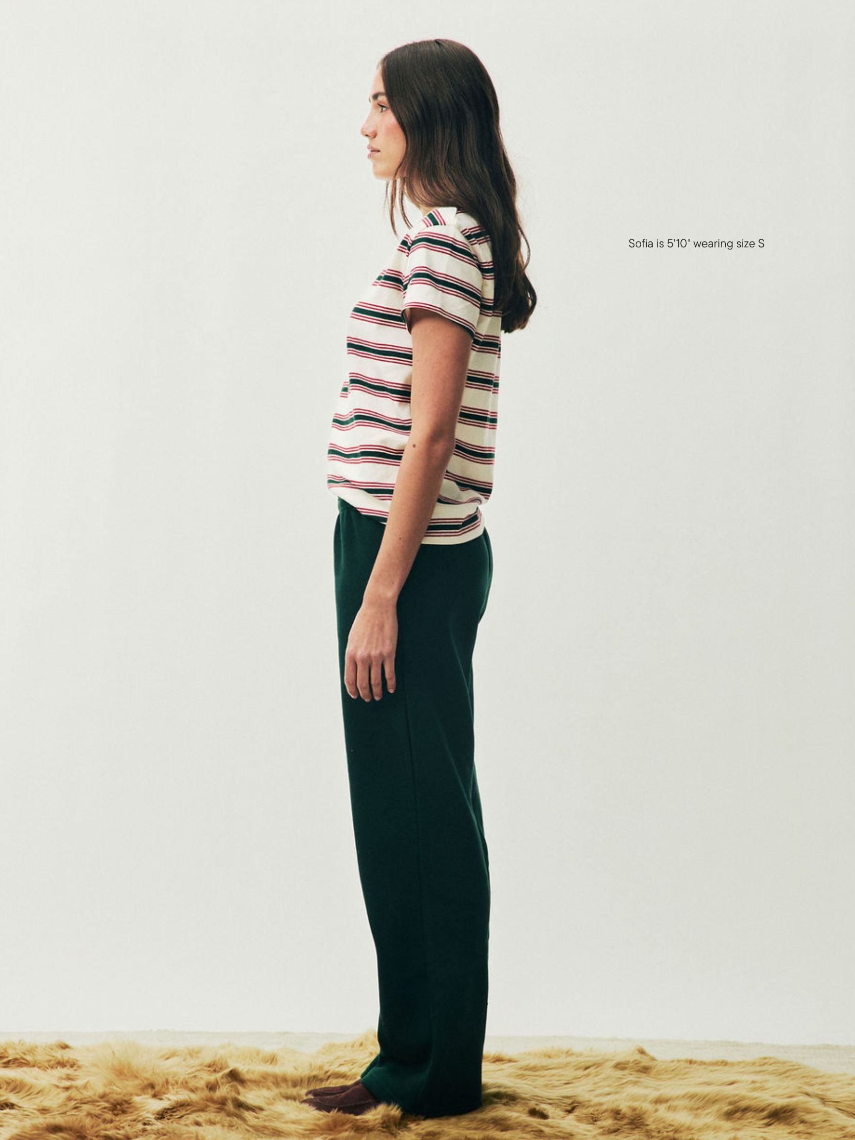 girl wearing Holiday Boxer Sweatpants -forest