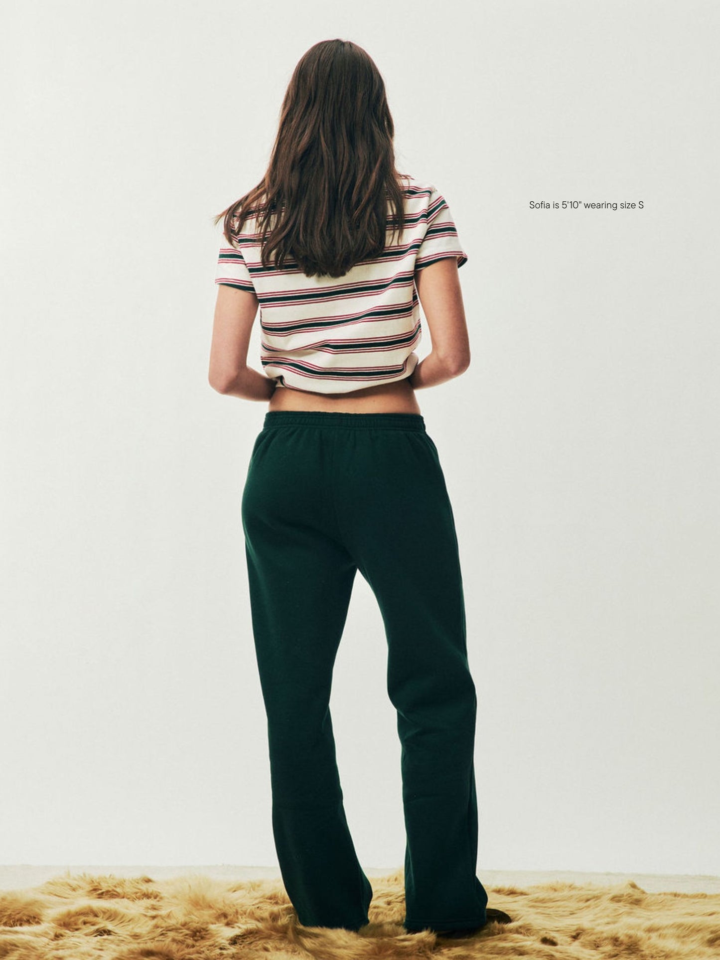 girl wearing Holiday Boxer Sweatpants -forest